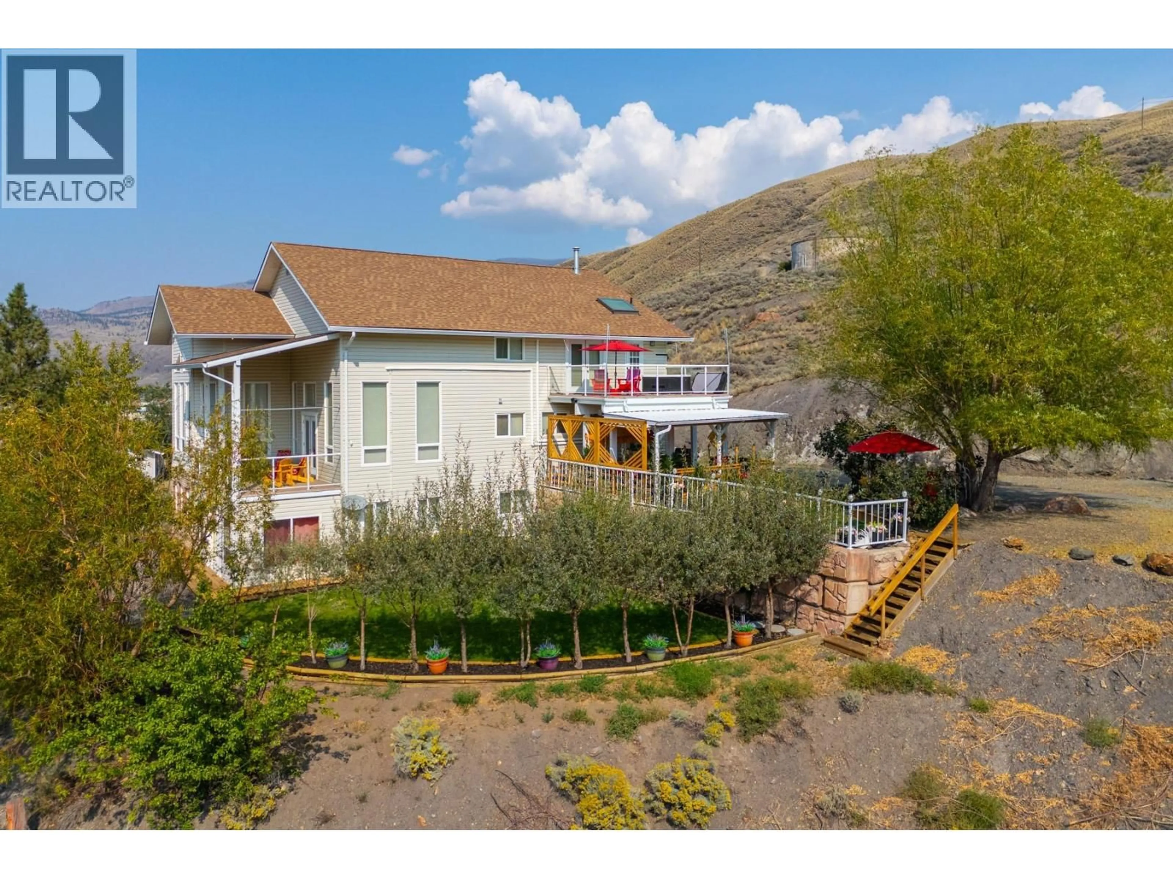 A pic from outside/outdoor area/front of a property/back of a property/a pic from drone, mountain view for 988 COLLINS ROAD, Cache Creek British Columbia V0K1H0