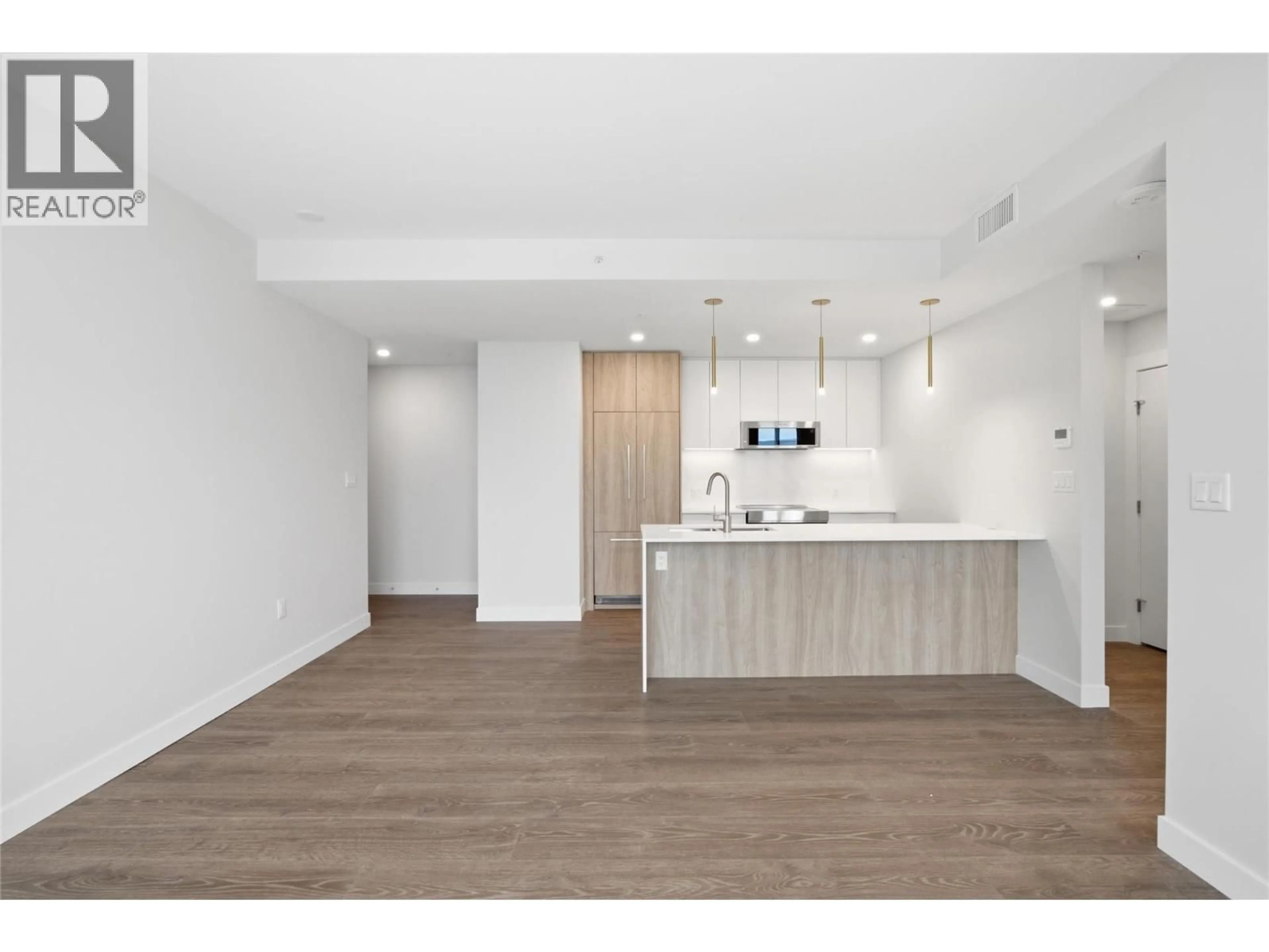 Open concept kitchen, wood/laminate floor for 1303 - 460 NICOLA STREET, Kamloops British Columbia V2C0N2