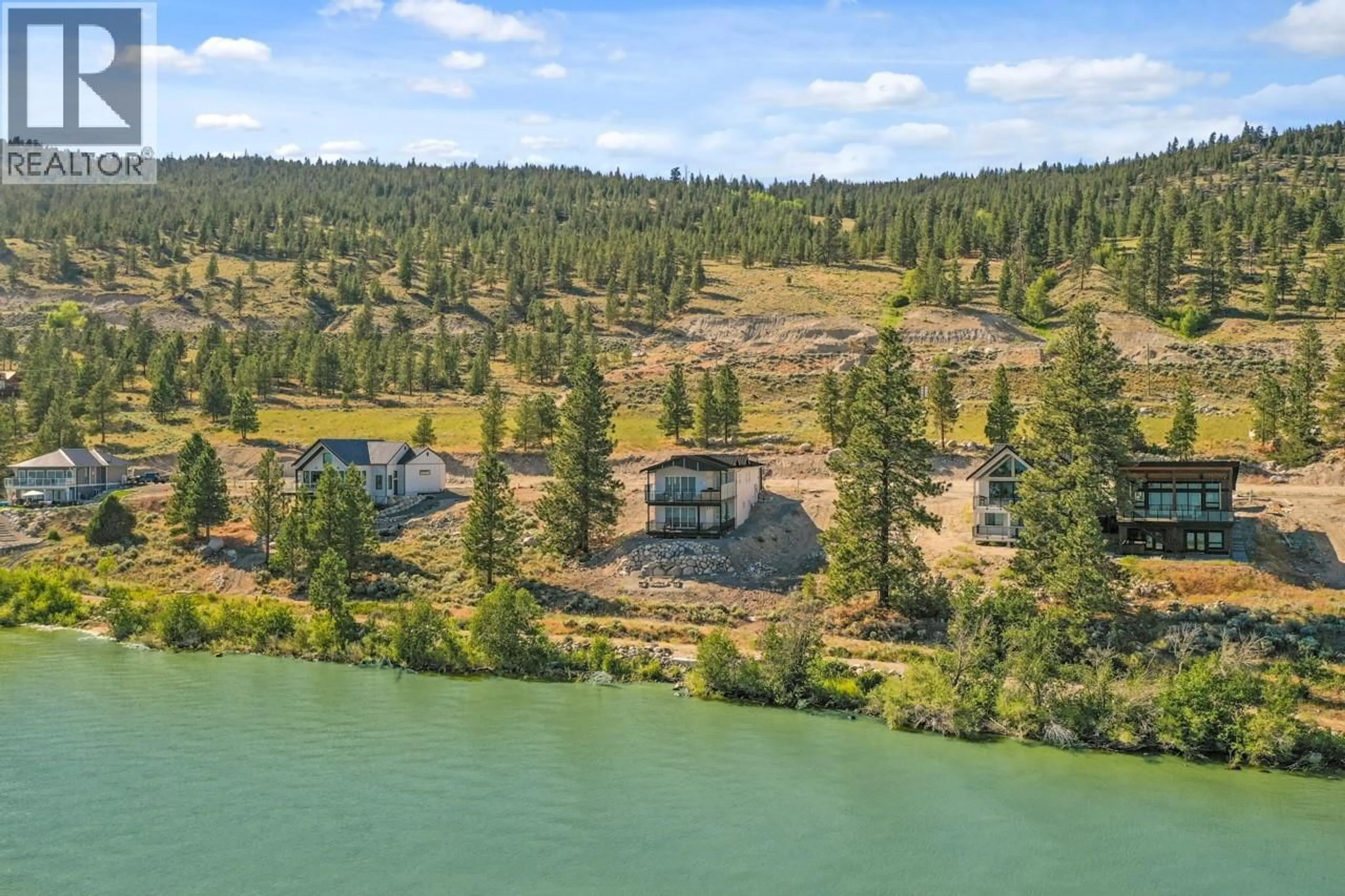 A pic from outside/outdoor area/front of a property/back of a property/a pic from drone, water/lake/river/ocean view for 21 - 6528 WATERSIDE TRAIL, Merritt British Columbia V1K0A1