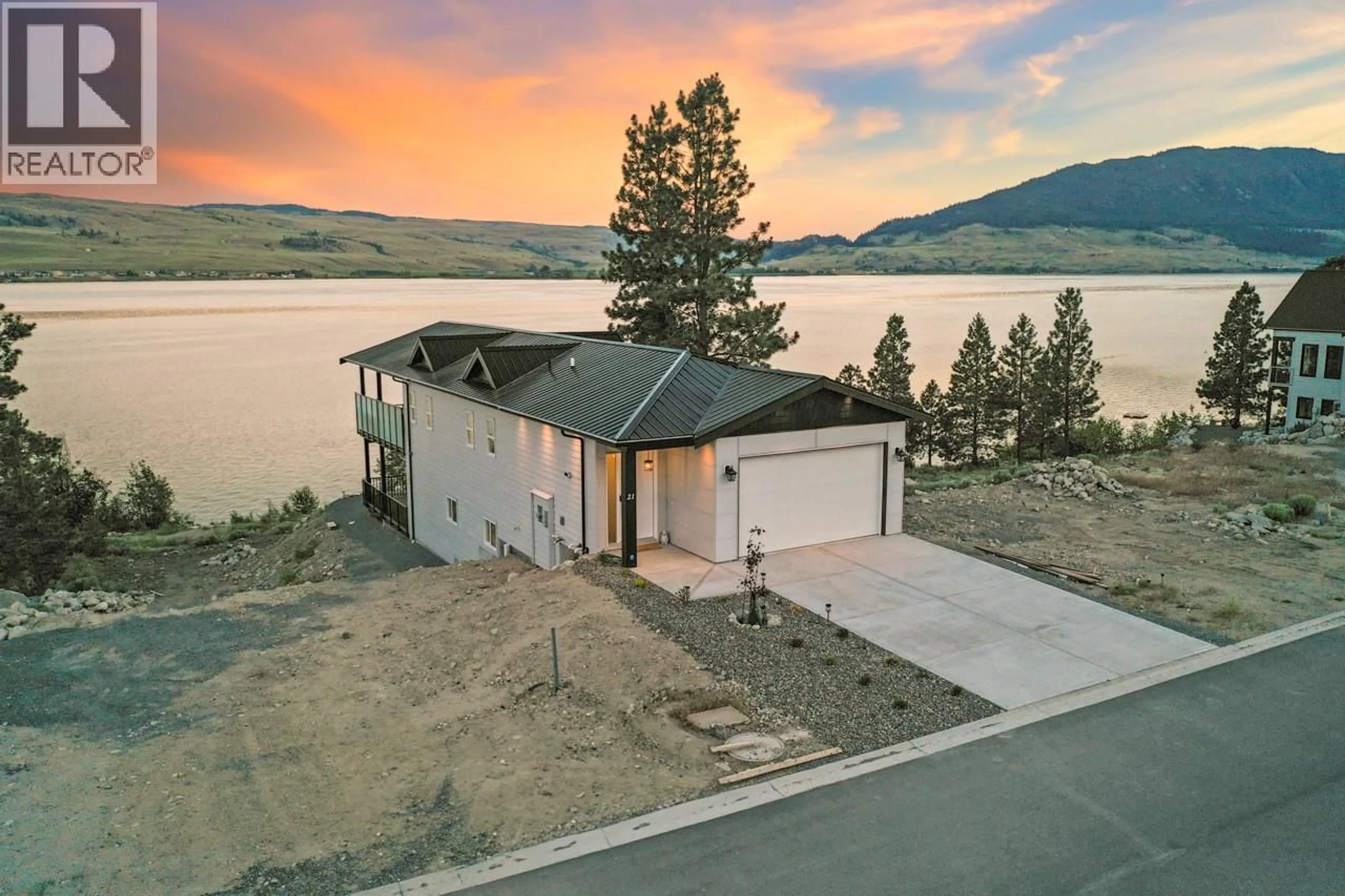 A pic from outside/outdoor area/front of a property/back of a property/a pic from drone, water/lake/river/ocean view for 21 - 6528 WATERSIDE TRAIL, Merritt British Columbia V1K0A1