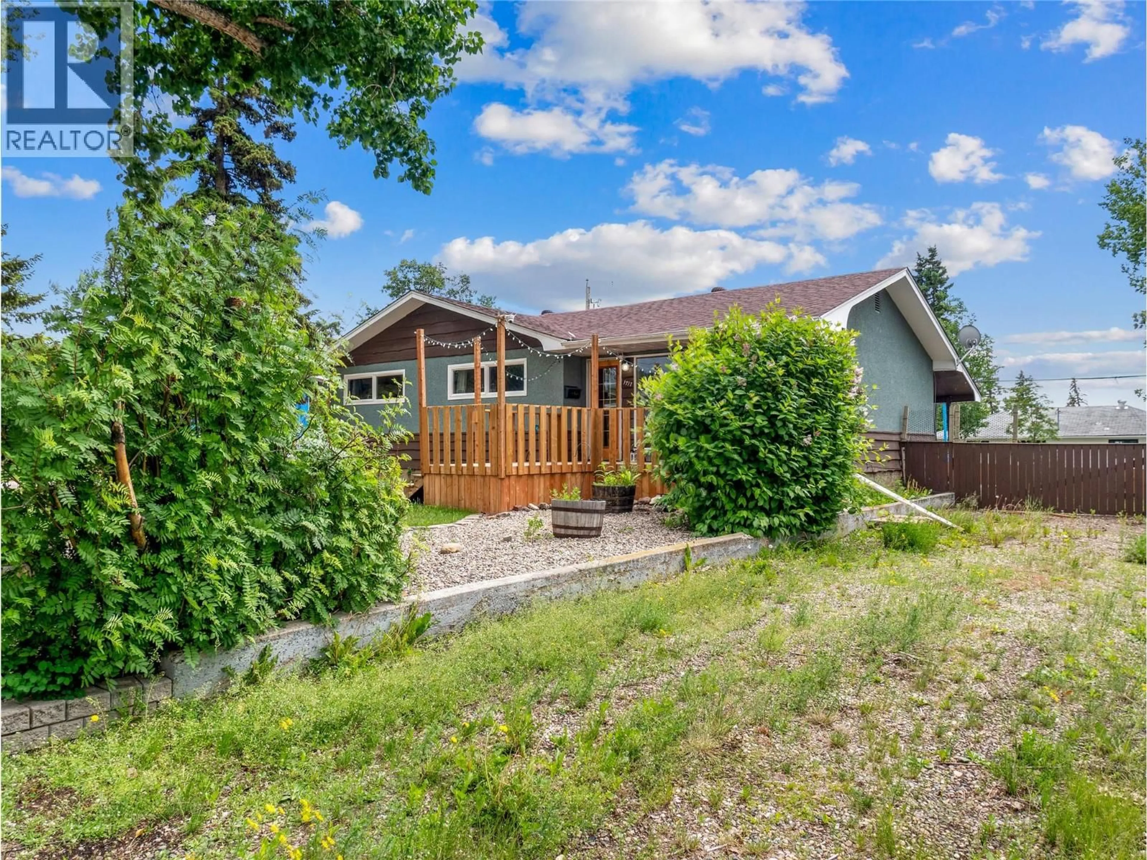 A pic from outside/outdoor area/front of a property/back of a property/a pic from drone, unknown for 1717 90 AVENUE, Dawson Creek British Columbia V1G1A5