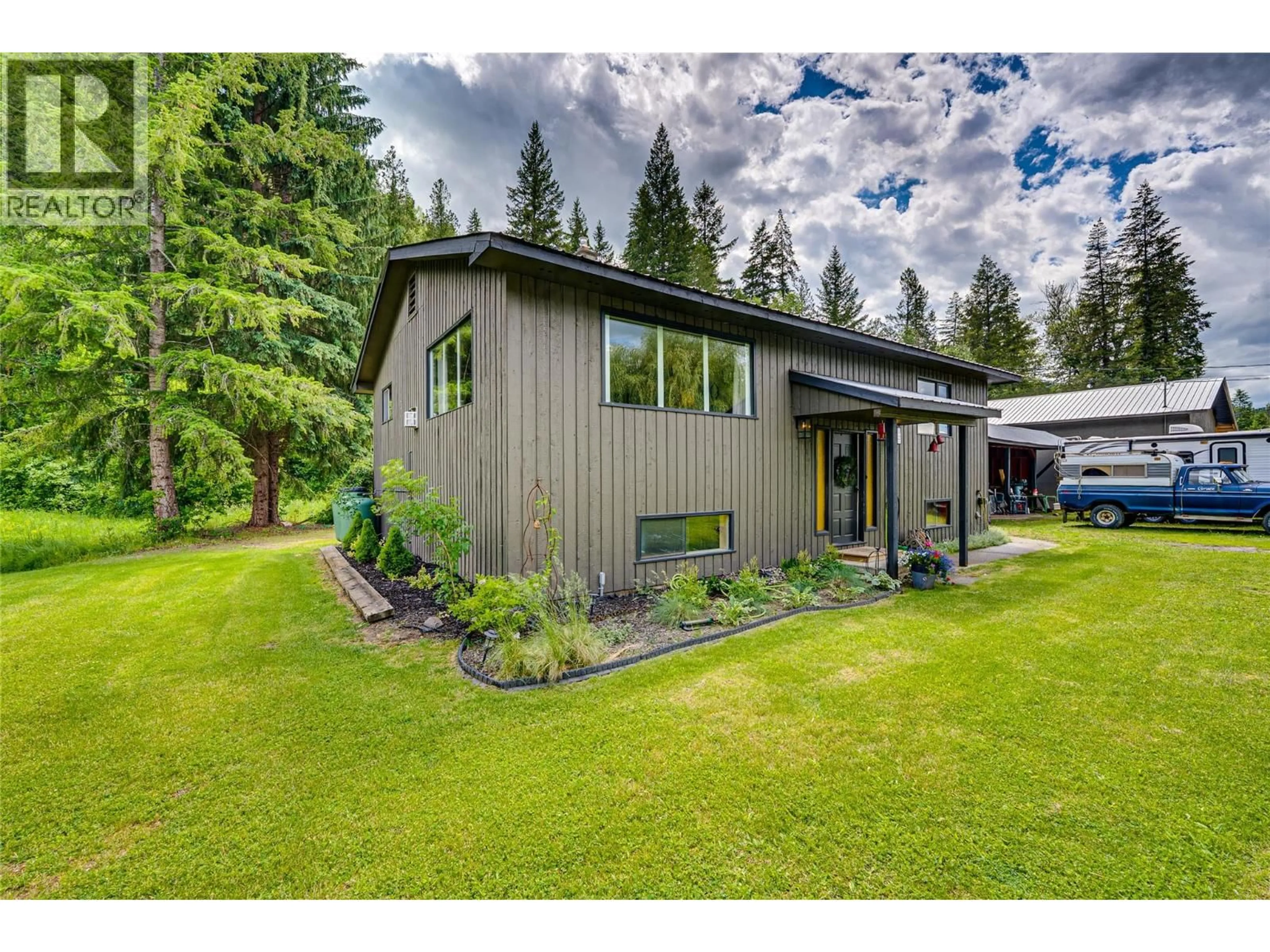 A pic from outside/outdoor area/front of a property/back of a property/a pic from drone, unknown for 1206 HIGHWAY 6 HIGHWAY, Cherryville British Columbia V0E2G1