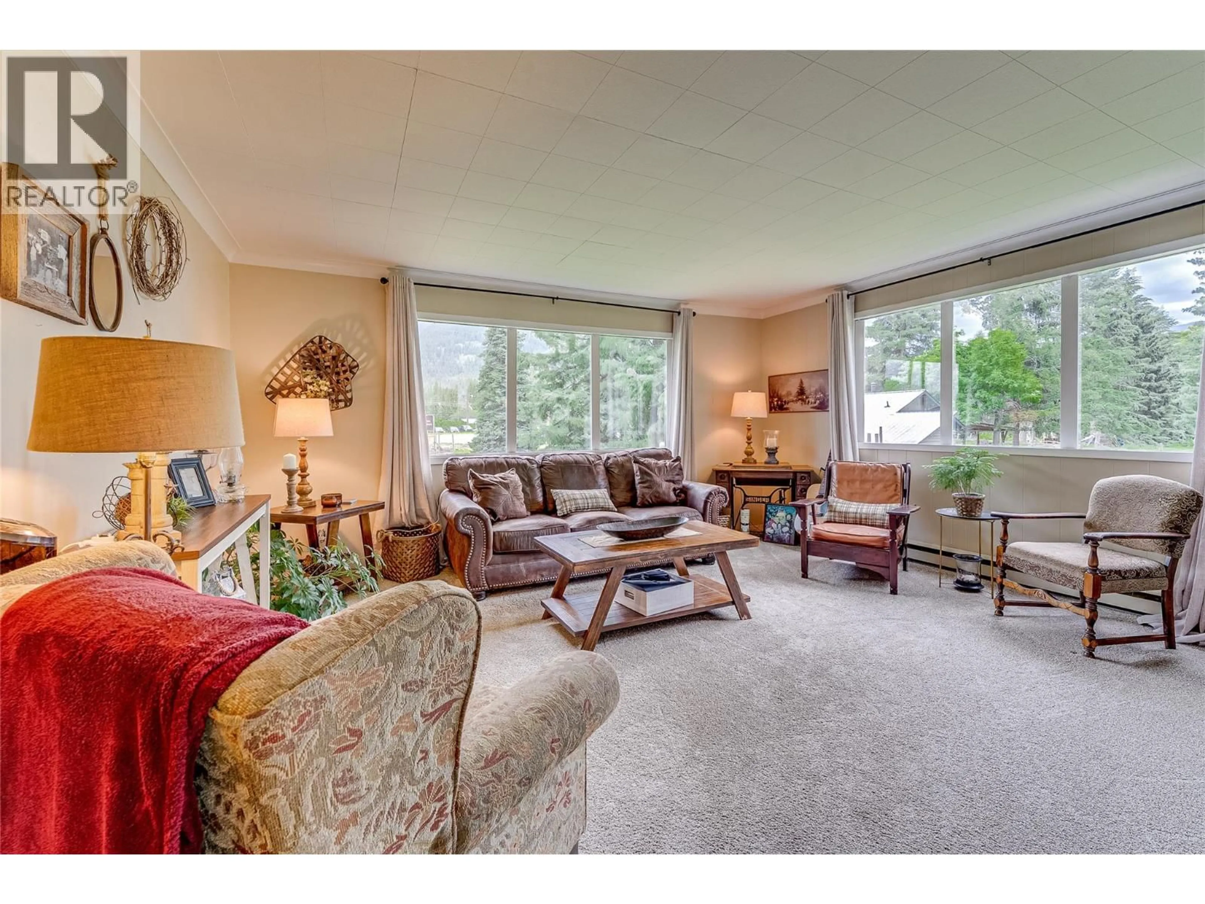 Living room with furniture, carpet floor for 1206 HIGHWAY 6 HIGHWAY, Cherryville British Columbia V0E2G1