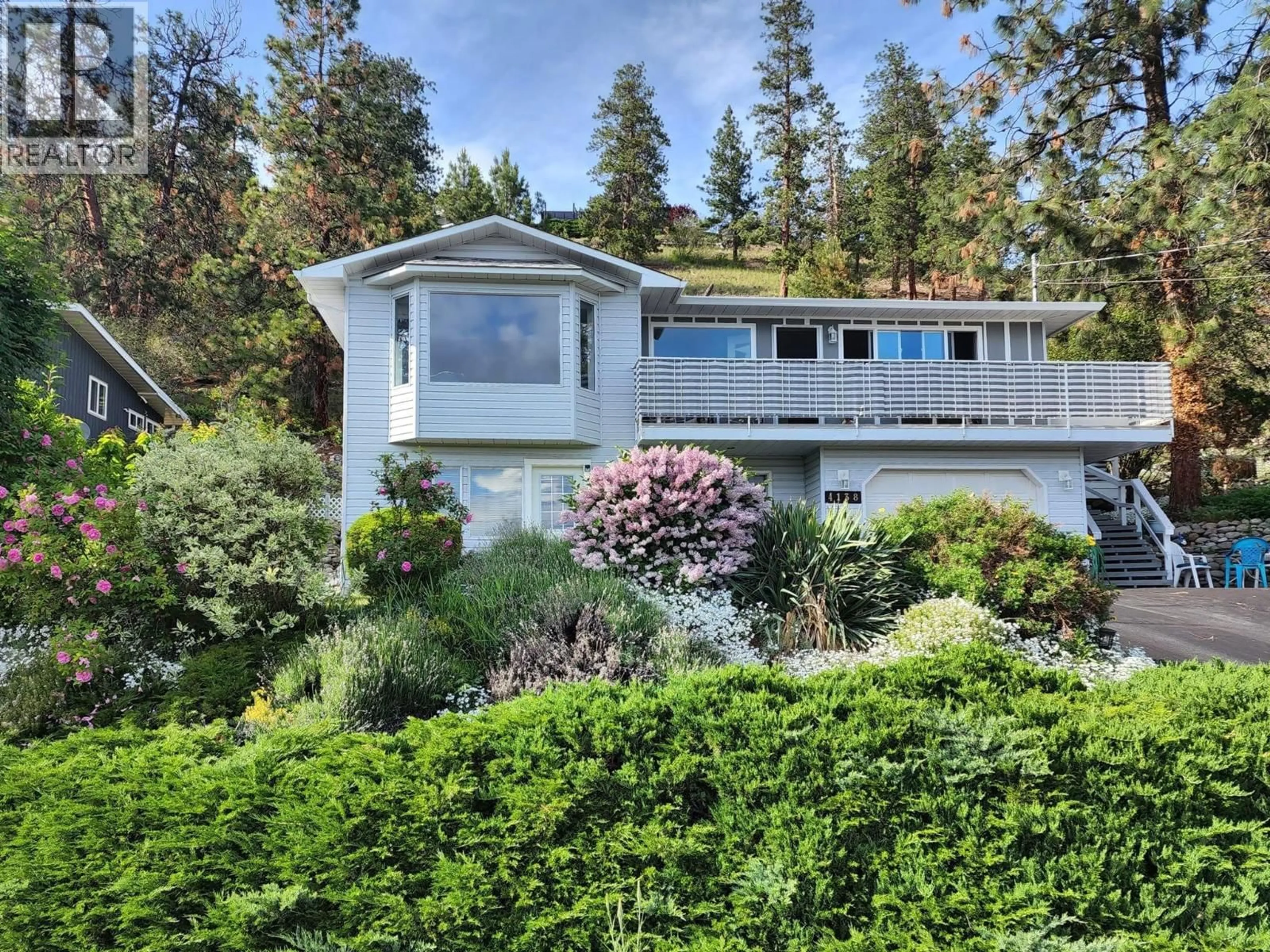 Home with vinyl exterior material, unknown for 4138 4TH AVENUE, Peachland British Columbia V0H1X5