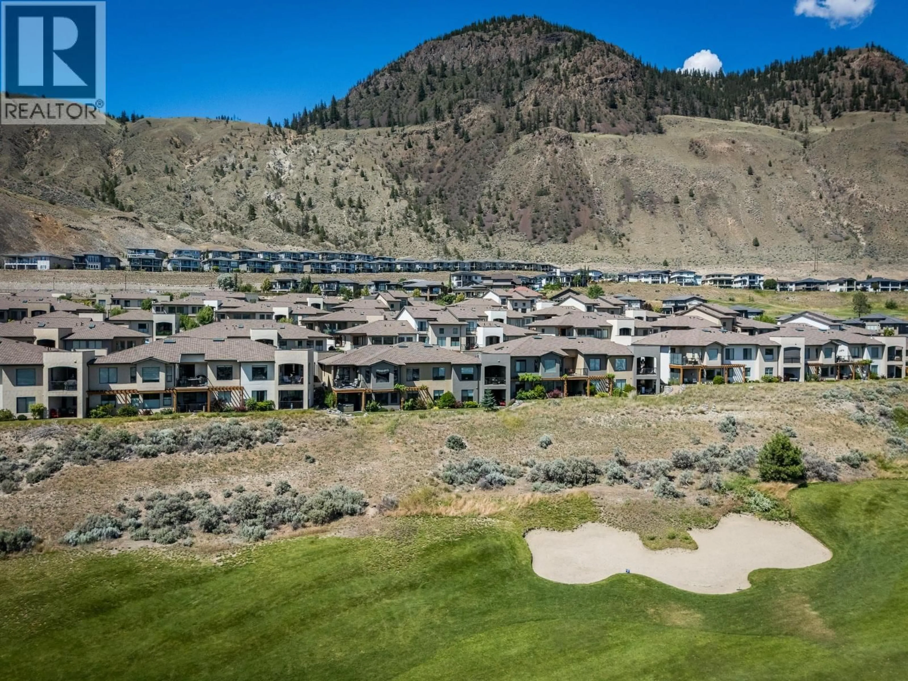 A pic from outside/outdoor area/front of a property/back of a property/a pic from drone, mountain view for 144 BELMONTE WAY, Kamloops British Columbia V2H0C6