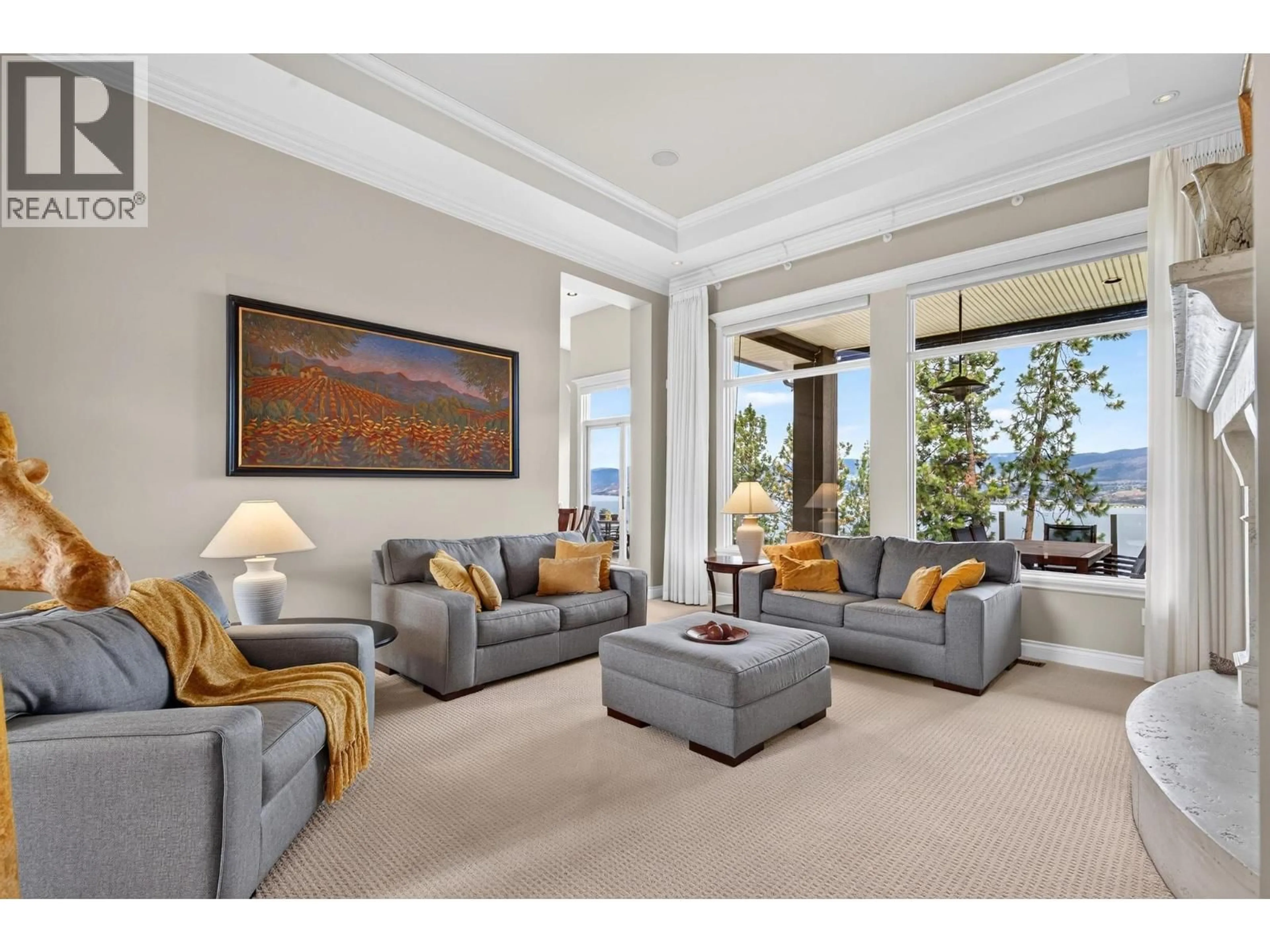 Living room with furniture, carpet floor for 5386 TANAGER COURT, Kelowna British Columbia V1W4K5