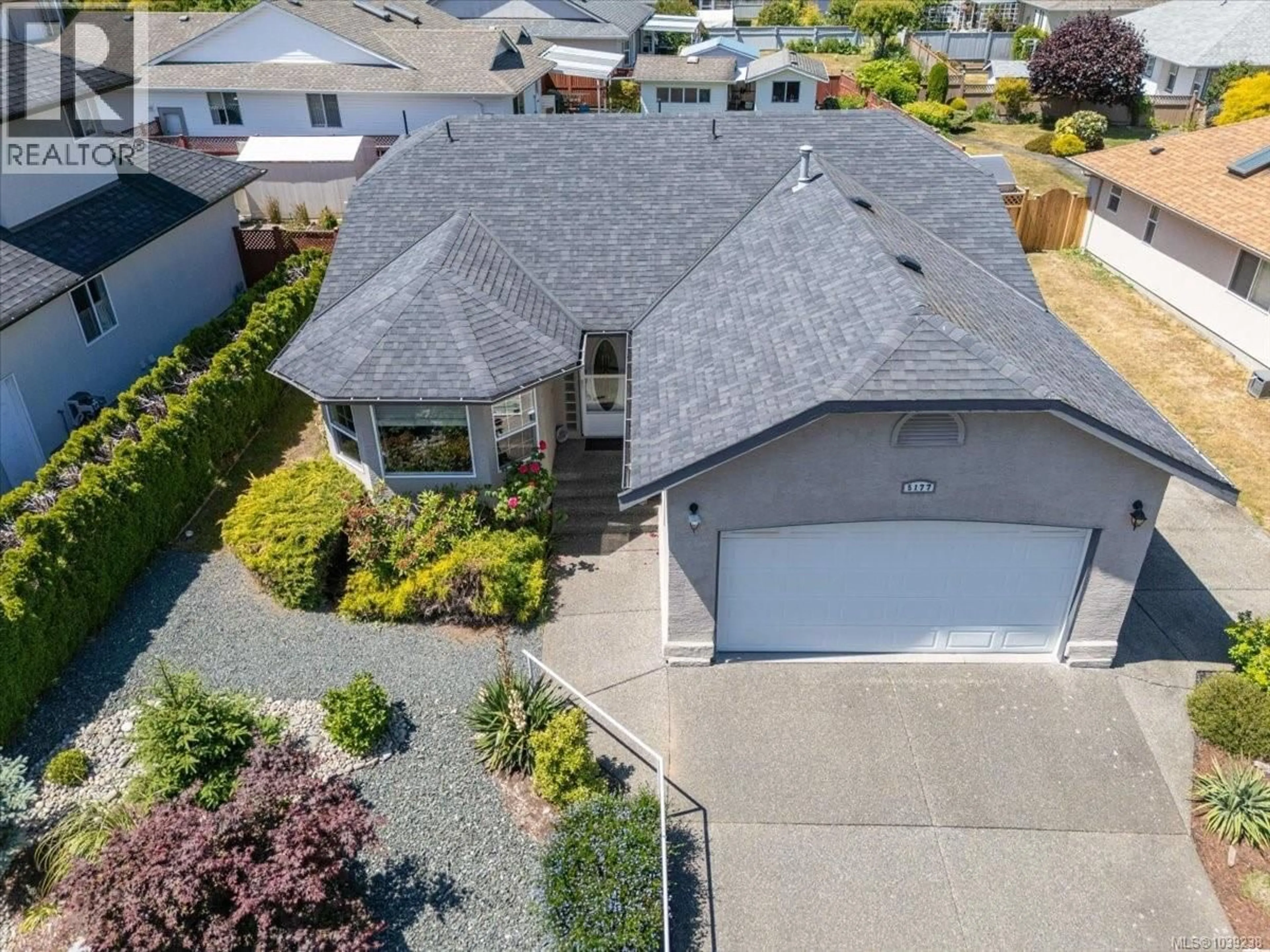 A pic from outside/outdoor area/front of a property/back of a property/a pic from drone, street for 5177 SAM'S WAY, Nanaimo British Columbia V9T6C4