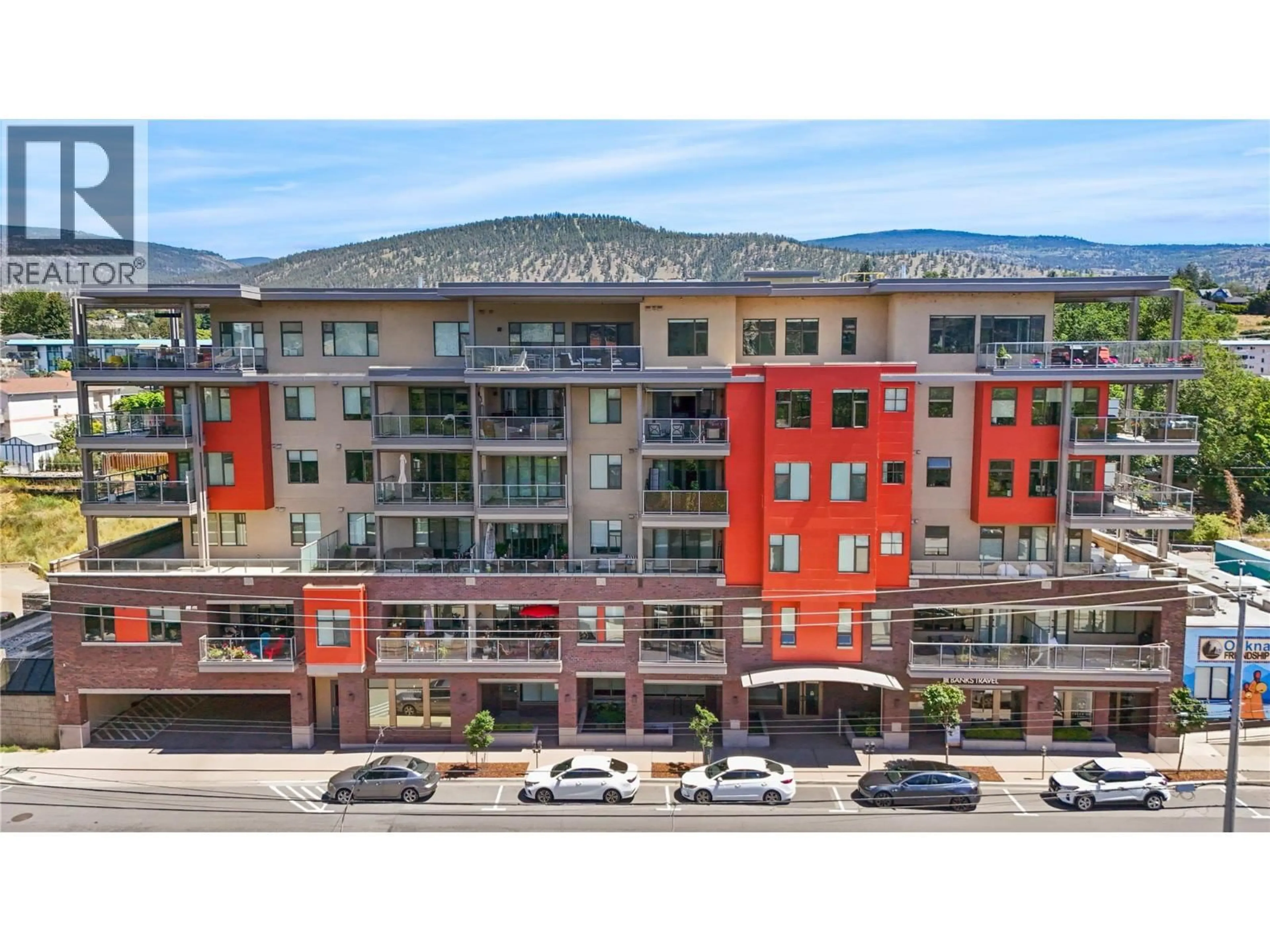 A pic from outside/outdoor area/front of a property/back of a property/a pic from drone, city buildings view from balcony for 406 - 110 ELLIS STREET, Penticton British Columbia V2A4L5