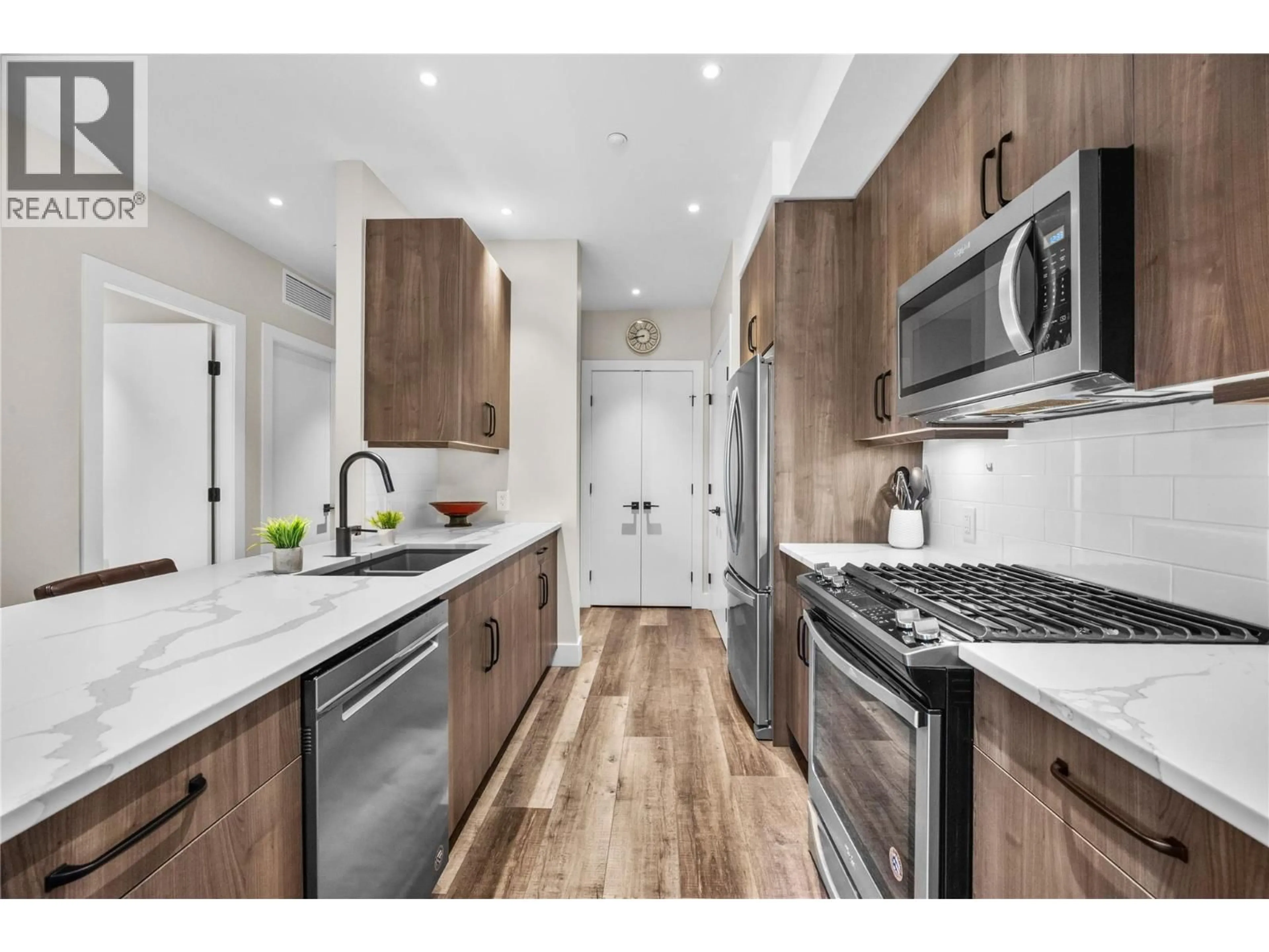 Open concept kitchen, unknown for 406 - 110 ELLIS STREET, Penticton British Columbia V2A4L5