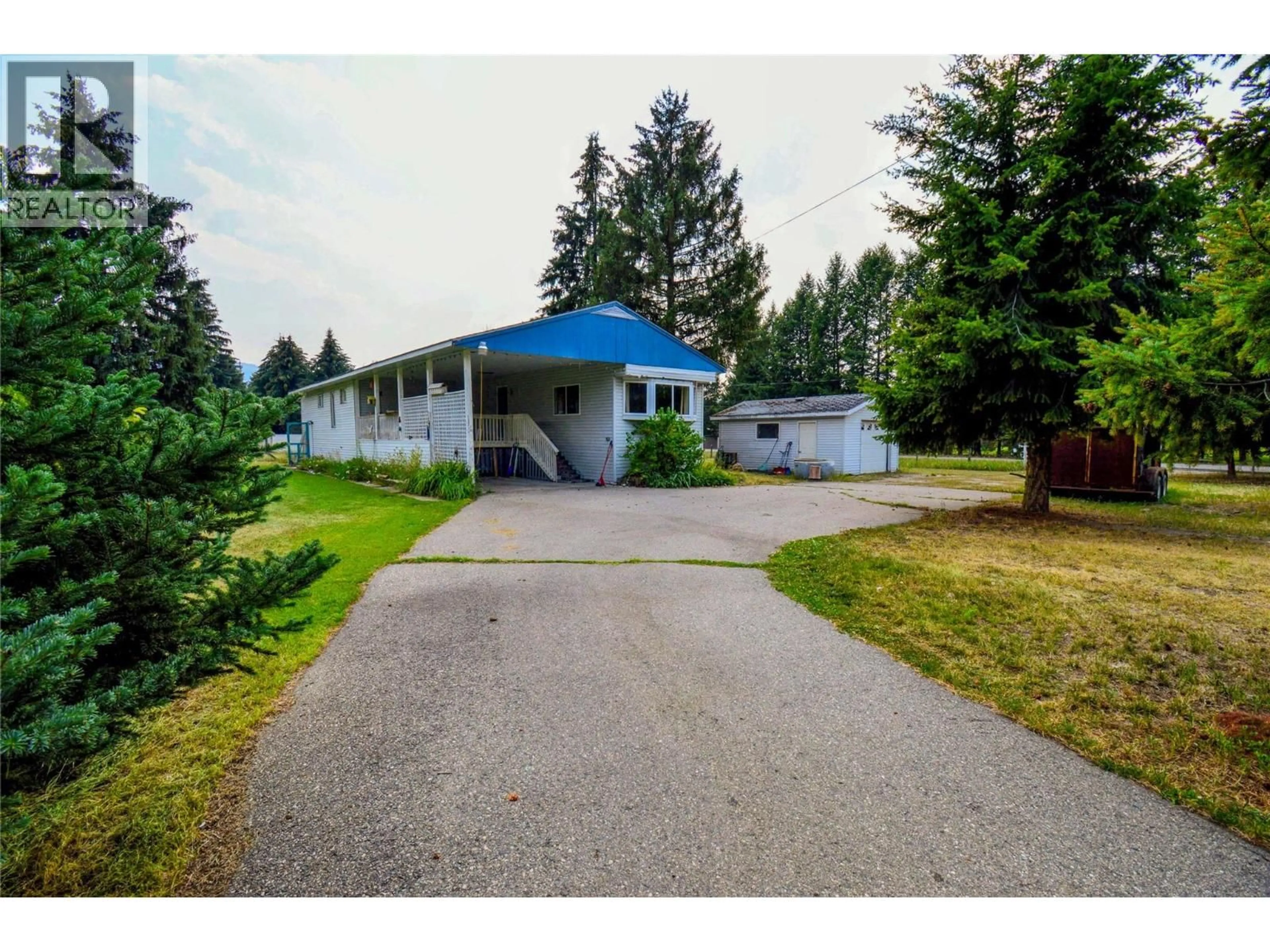 A pic from outside/outdoor area/front of a property/back of a property/a pic from drone, street for 7010 RANKEN ROAD, Grand Forks British Columbia V0H1H2