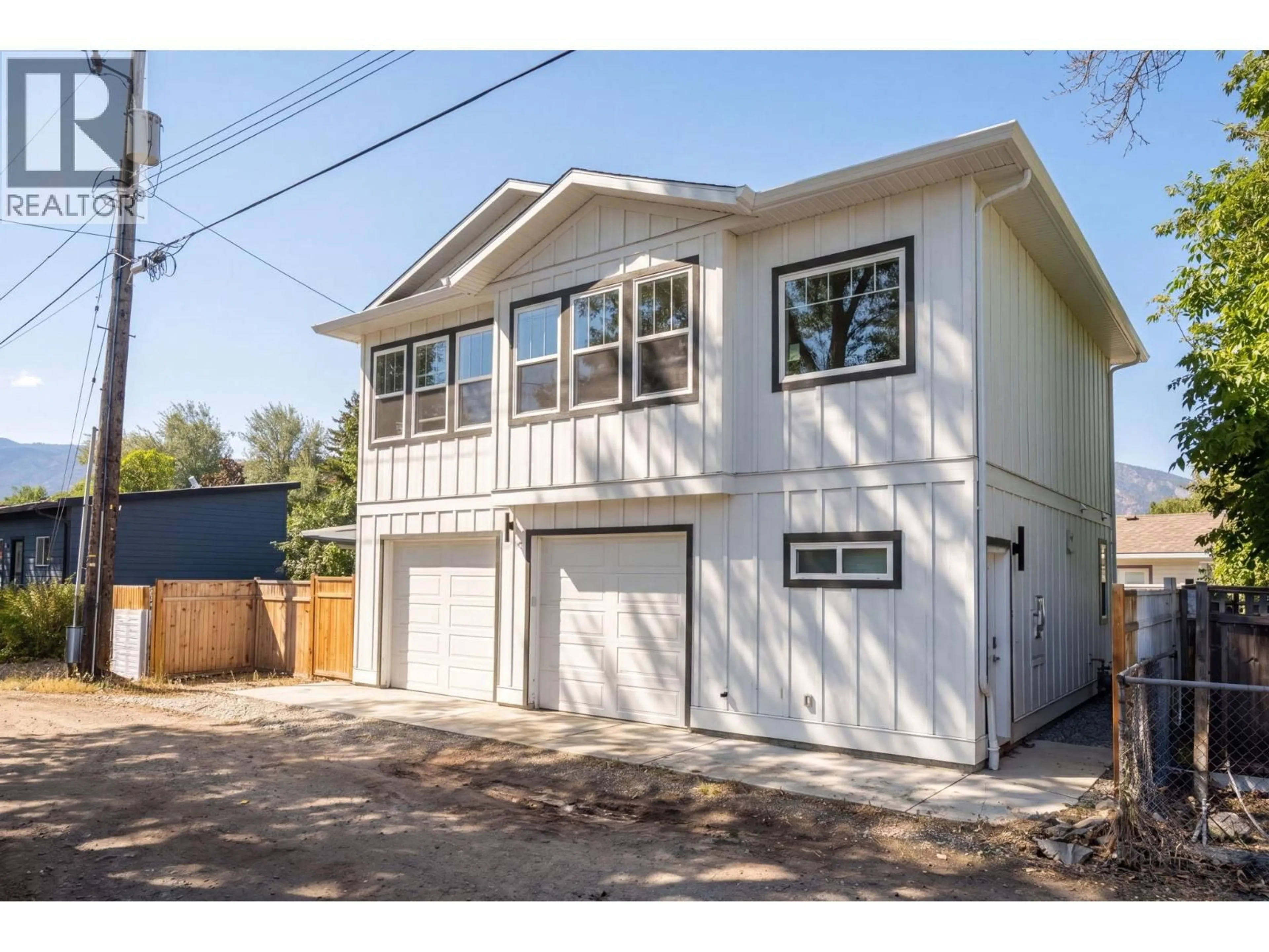 Home with vinyl exterior material, street for 1030 TIMMINS STREET, Penticton British Columbia V2A5V2