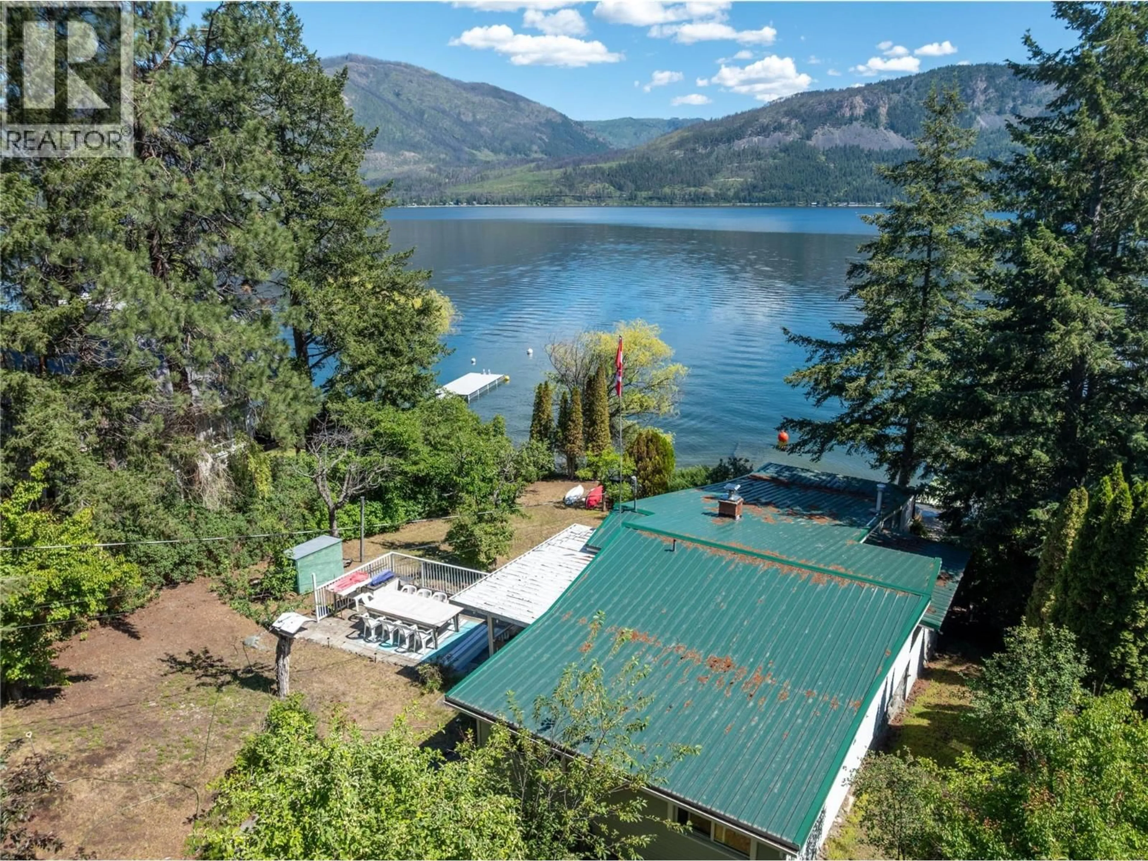 A pic from outside/outdoor area/front of a property/back of a property/a pic from drone, water/lake/river/ocean view for 1281 LITTLE SHUSWAP LAKE ROAD, Chase British Columbia V0E1M2