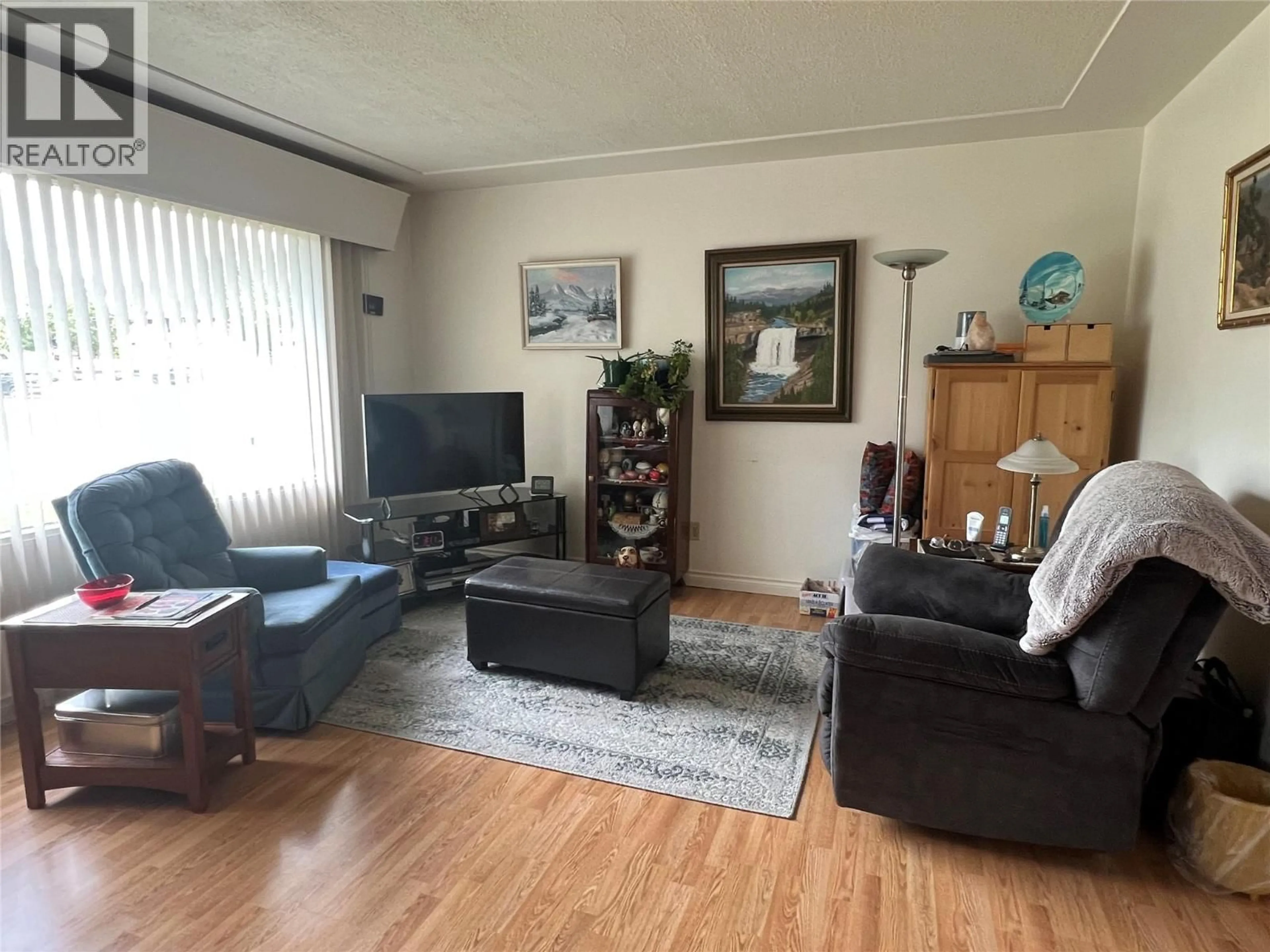 Living room with furniture, unknown for 1025 92 AVENUE, Dawson Creek British Columbia V1G1C2