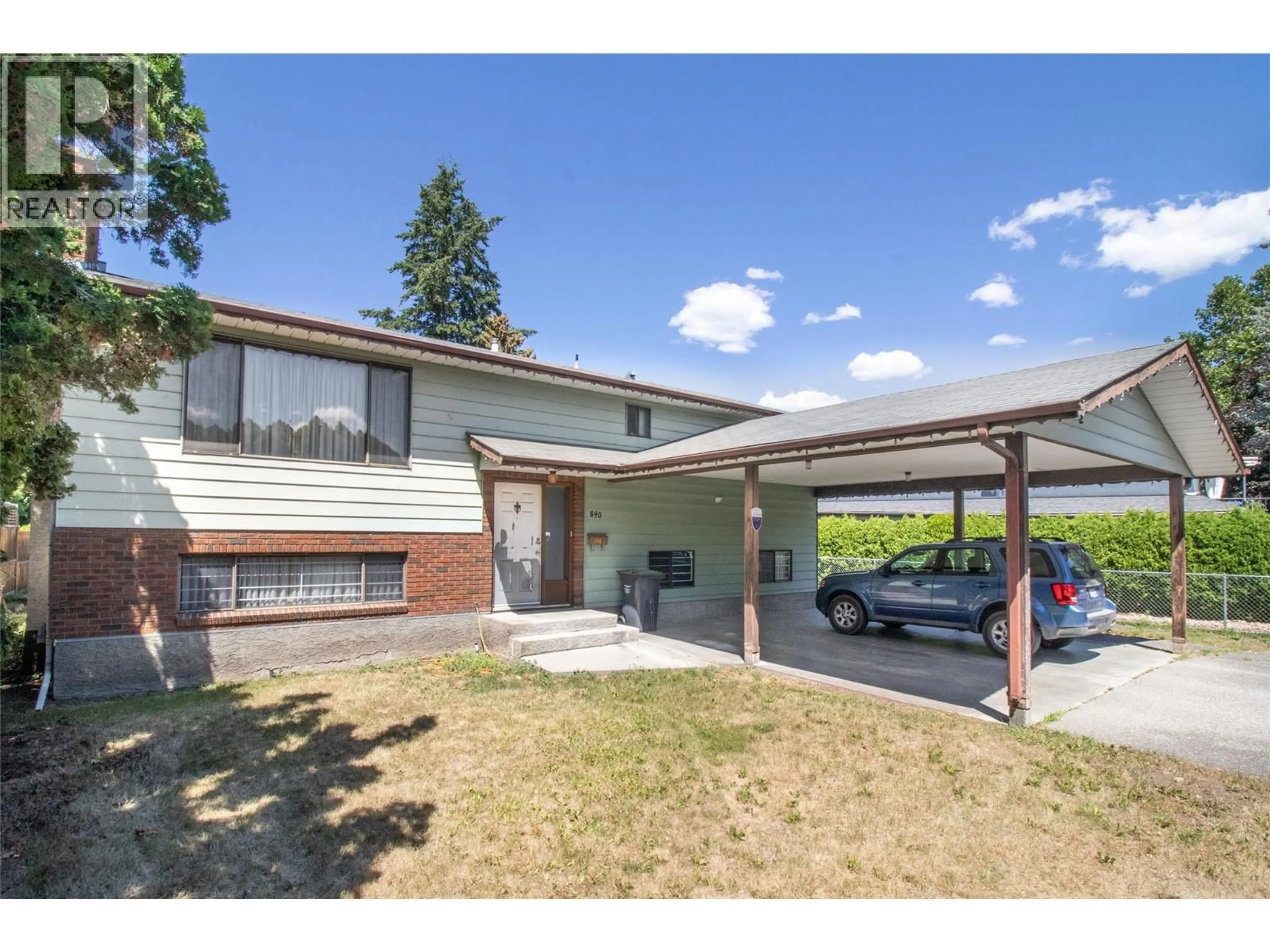A pic from outside/outdoor area/front of a property/back of a property/a pic from drone, street for 890 THEODORA ROAD, Kelowna British Columbia V1X5T2