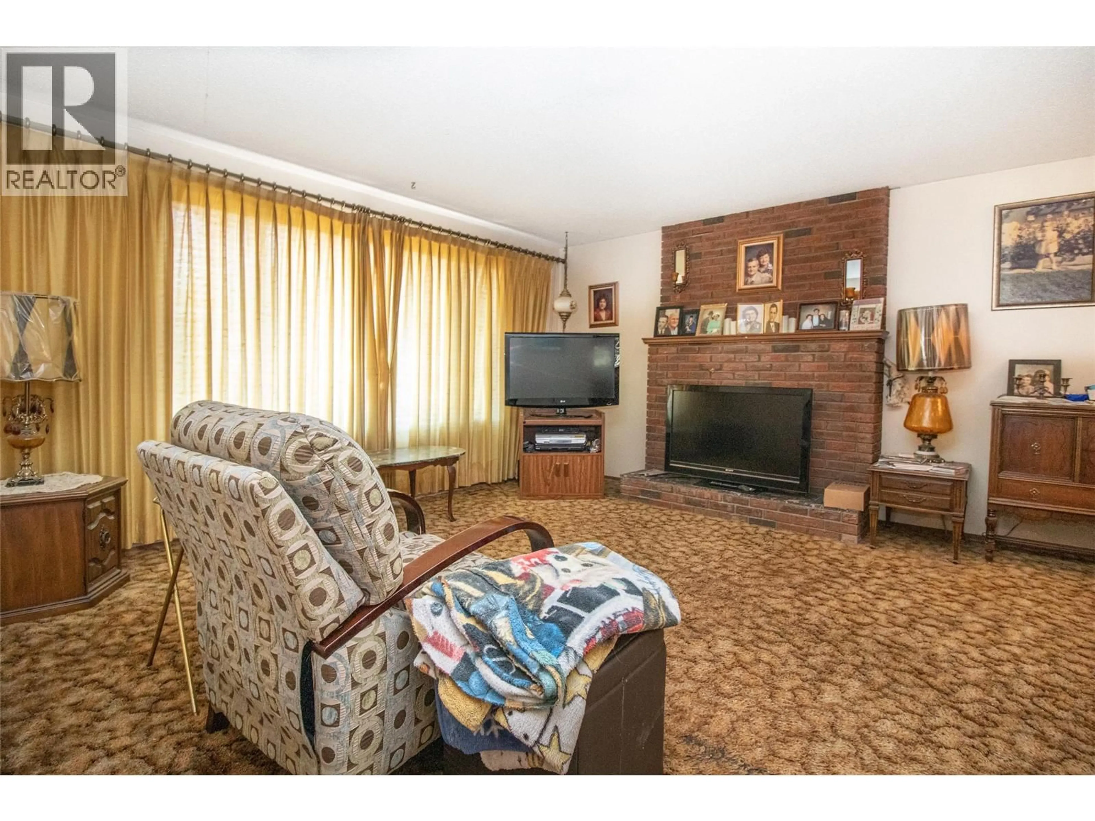 Living room with furniture, unknown for 890 THEODORA ROAD, Kelowna British Columbia V1X5T2