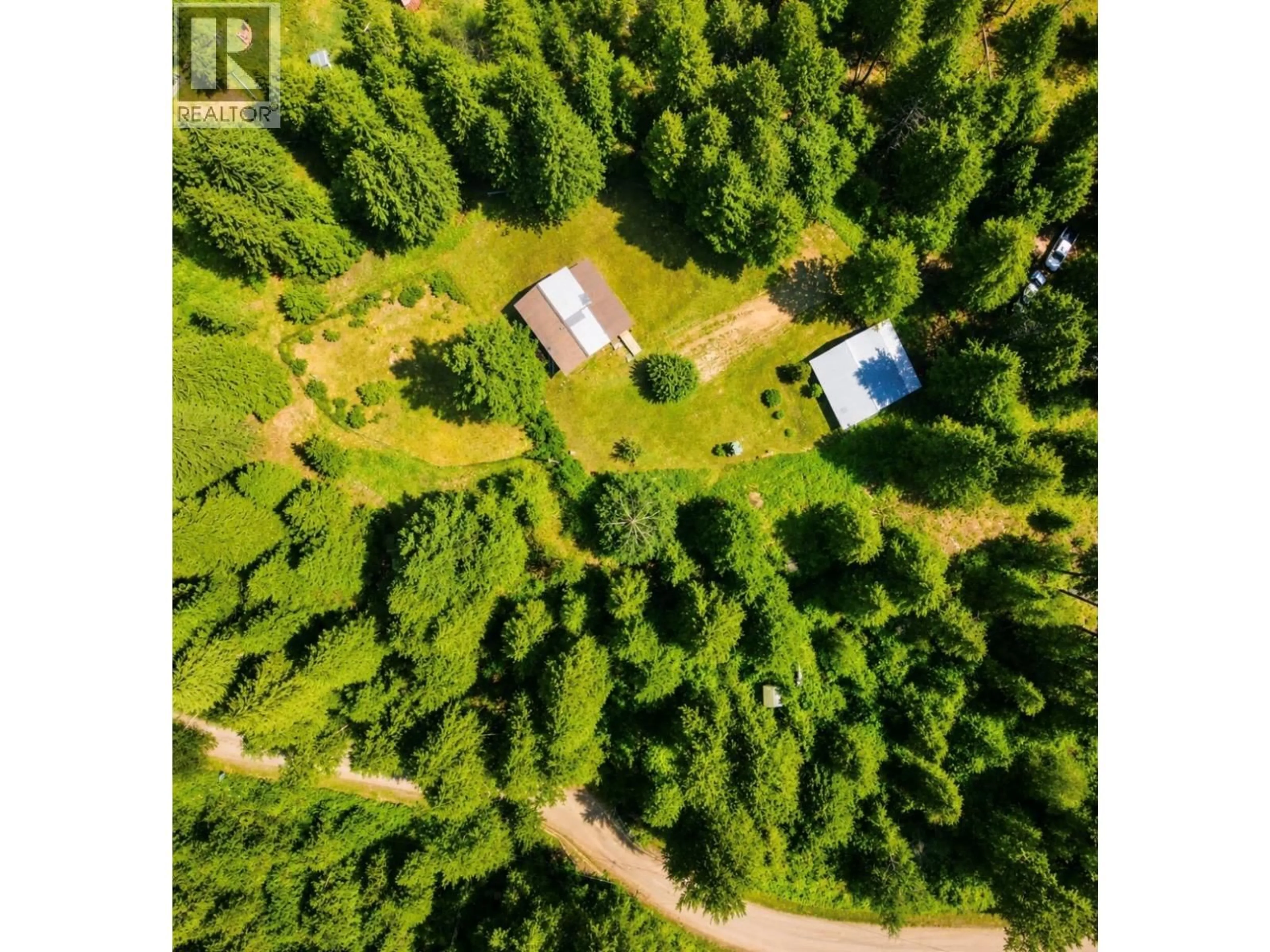 A pic from outside/outdoor area/front of a property/back of a property/a pic from drone, forest/trees view for 10555 GRANBY ROAD, Grand Forks British Columbia V0H1H1