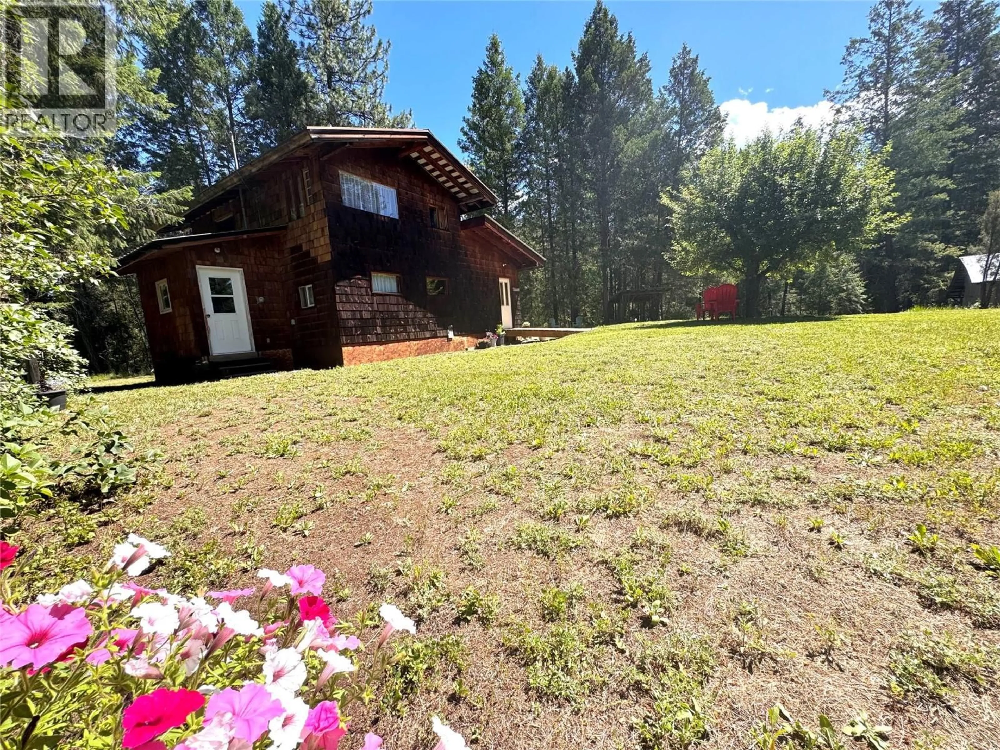 A pic from outside/outdoor area/front of a property/back of a property/a pic from drone, mountain view for 10555 GRANBY ROAD, Grand Forks British Columbia V0H1H1