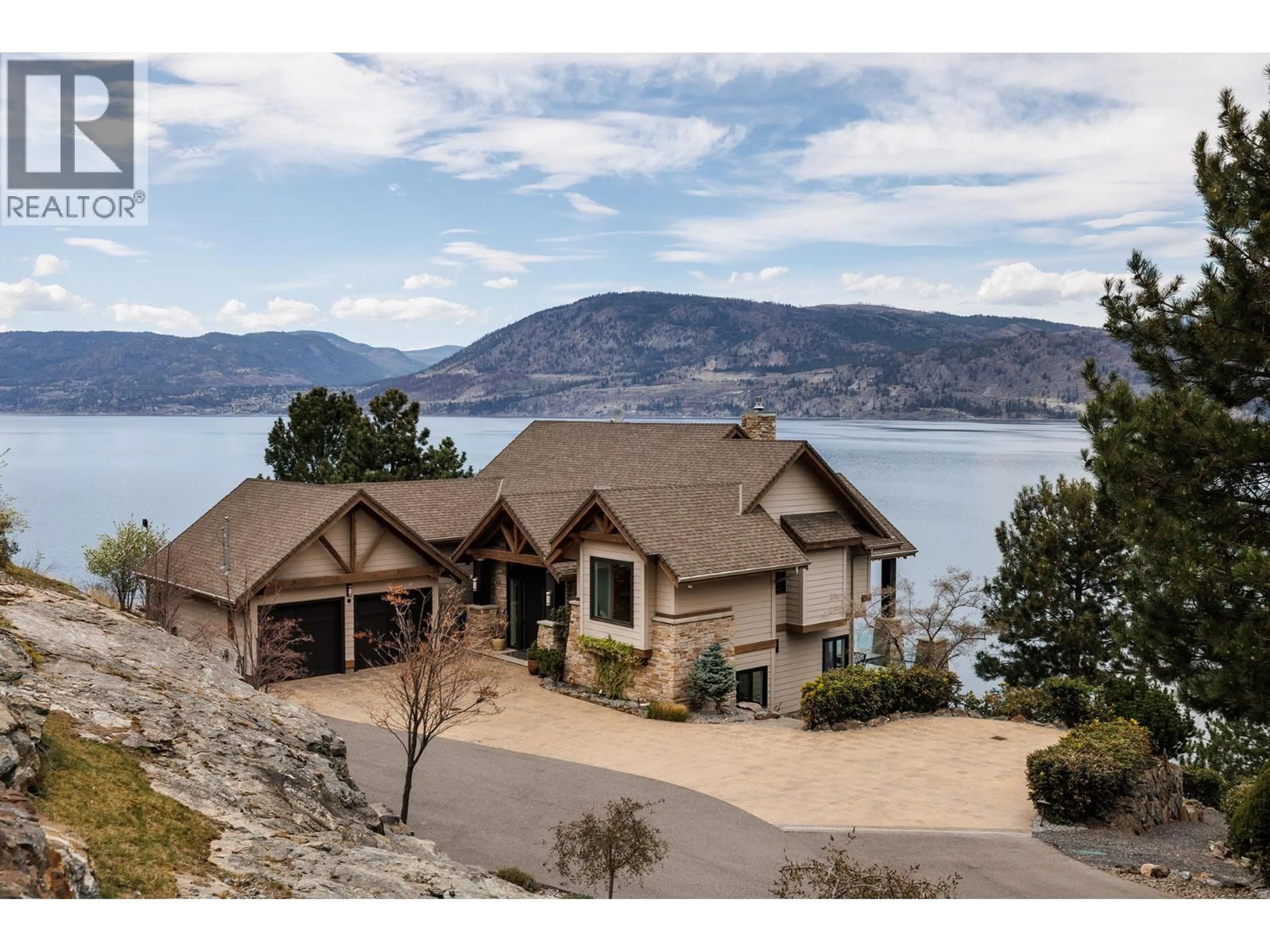 A pic from outside/outdoor area/front of a property/back of a property/a pic from drone, water/lake/river/ocean view for 6850 LAKESHORE ROAD, Kelowna British Columbia V1W4J5