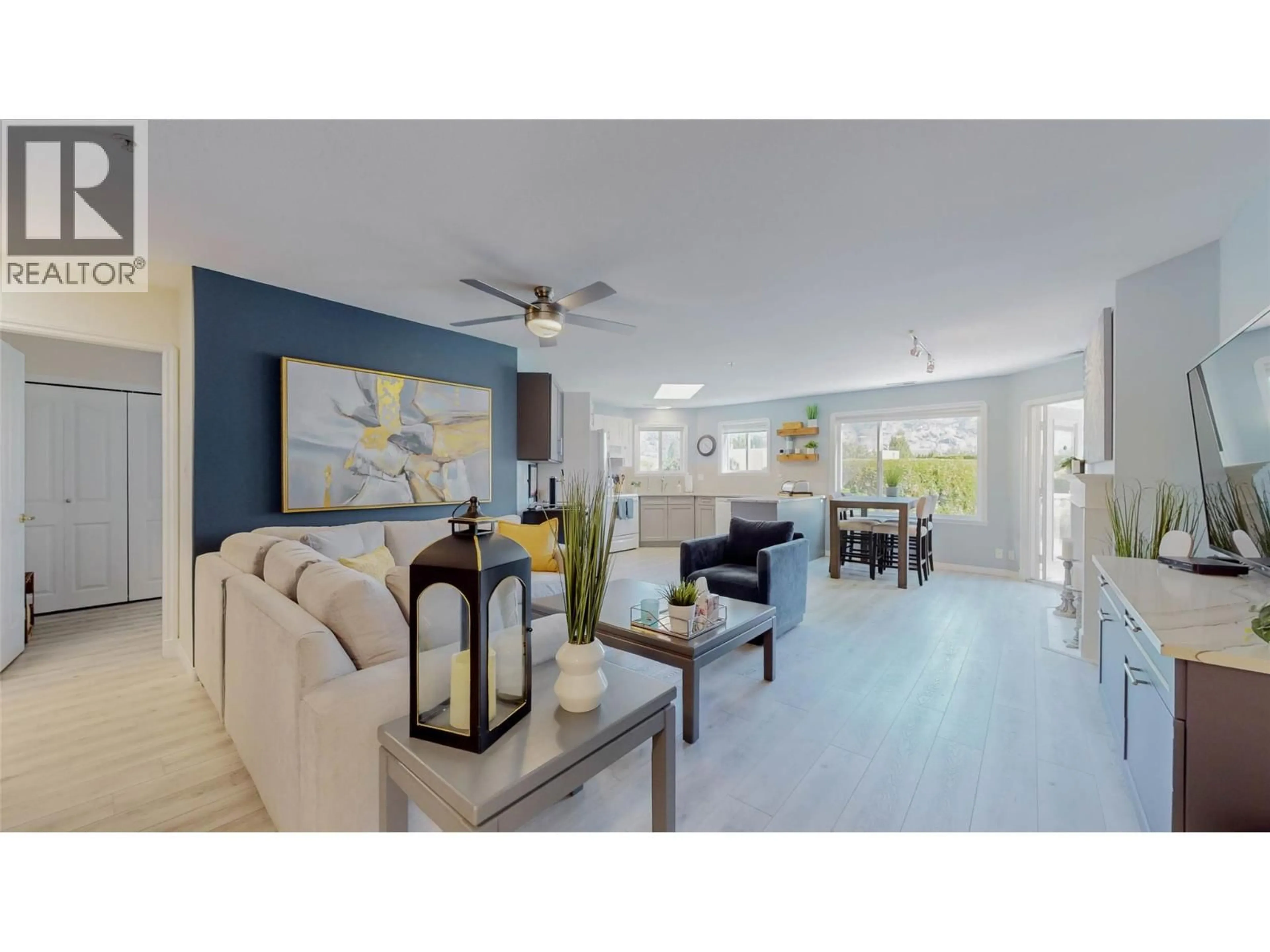 Living room with furniture, ceramic/tile floor for 105 - 6805 COTTONWOOD DRIVE, Osoyoos British Columbia V0H1V3