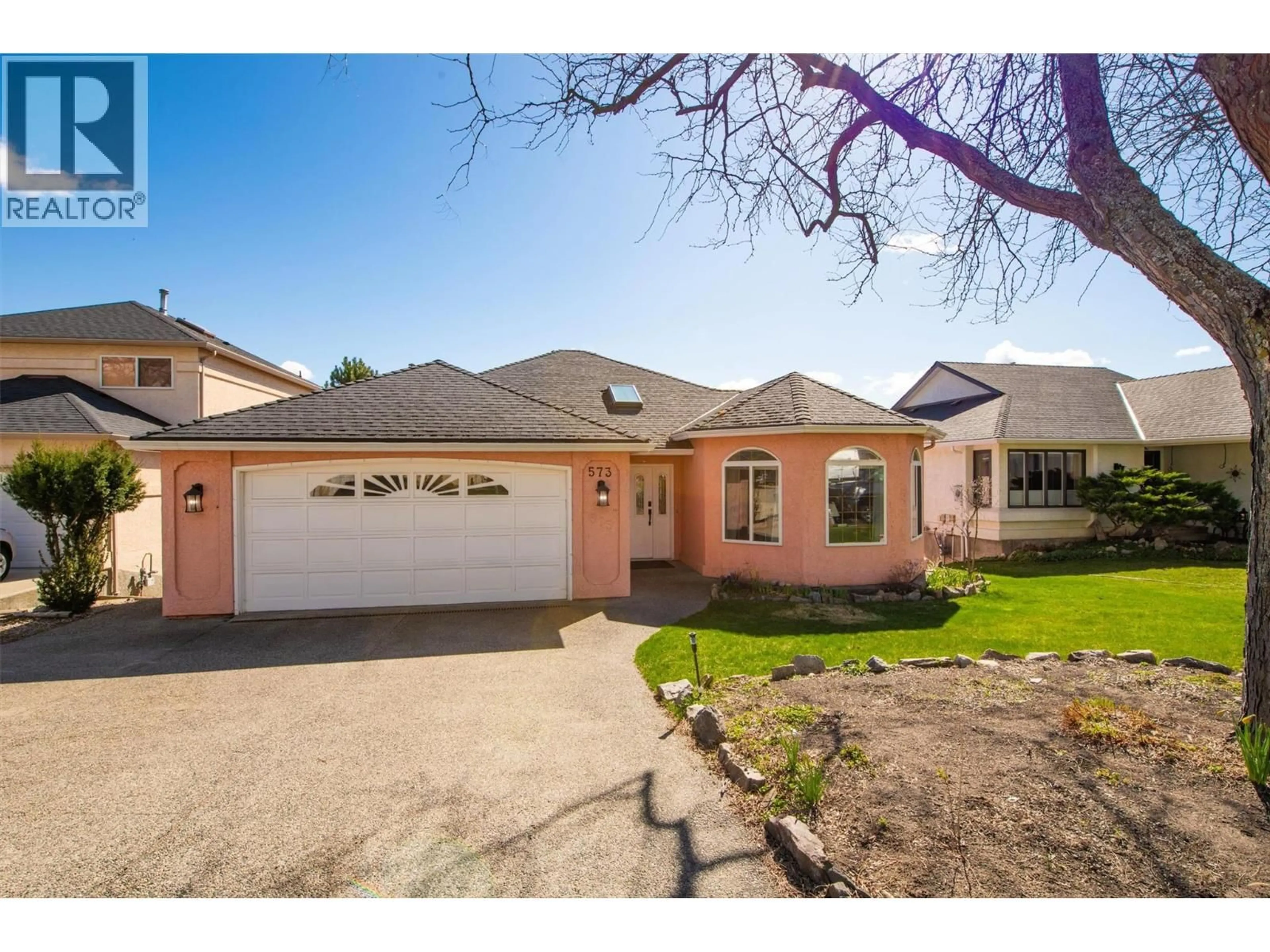 Home with brick exterior material, street for 573 SPRUCEVIEW PLACE NORTH, Kelowna British Columbia V1V1S7