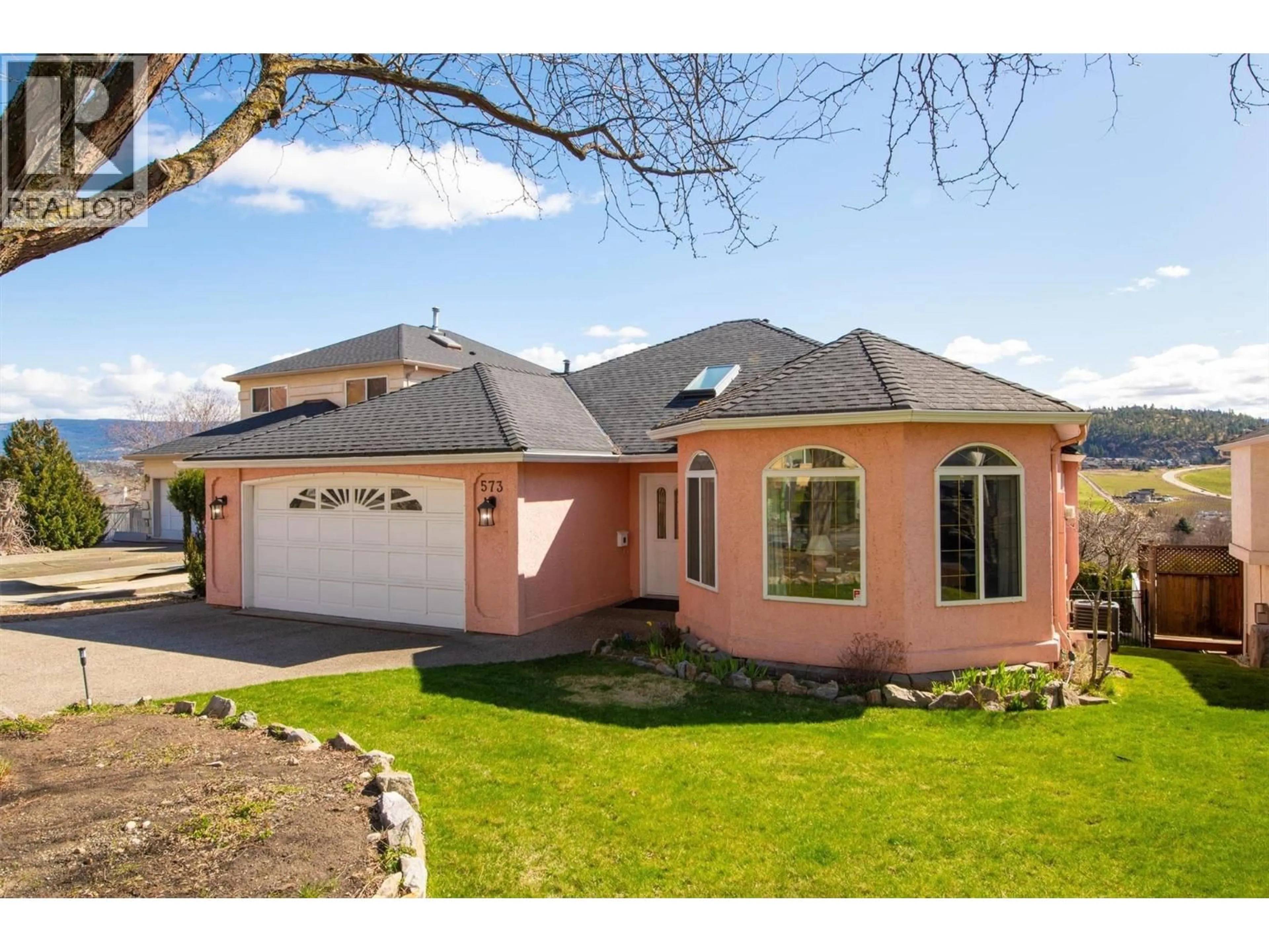 Home with brick exterior material, street for 573 SPRUCEVIEW PLACE NORTH, Kelowna British Columbia V1V1S7