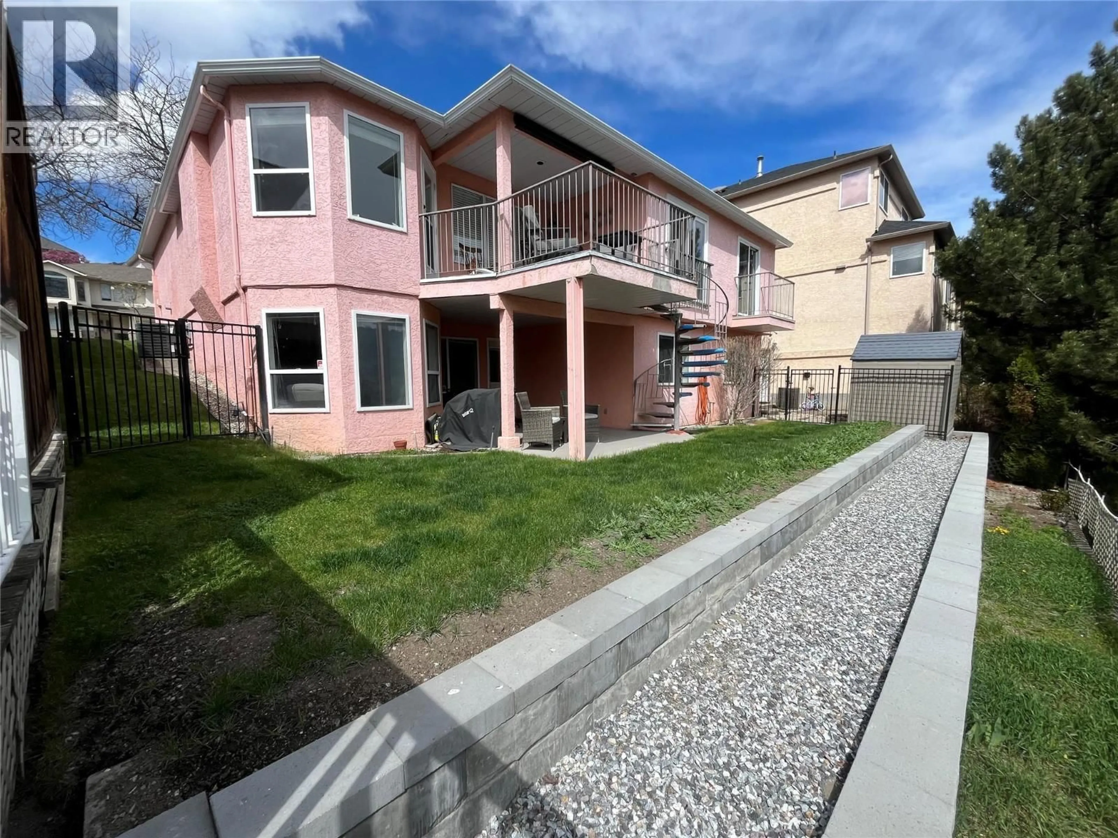 A pic from outside/outdoor area/front of a property/back of a property/a pic from drone, street for 573 SPRUCEVIEW PLACE NORTH, Kelowna British Columbia V1V1S7