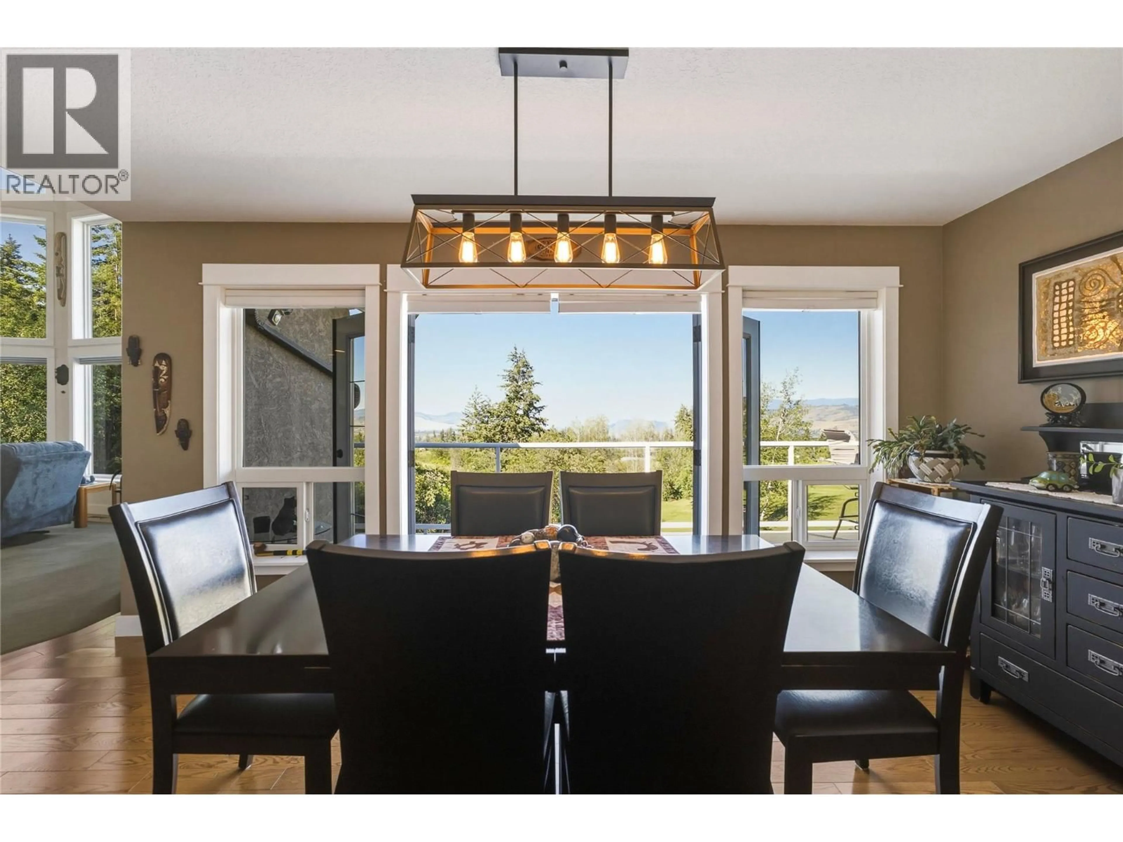 Dining room, wood/laminate floor for 5980 RANCH ROAD, Vernon British Columbia V1B3J9