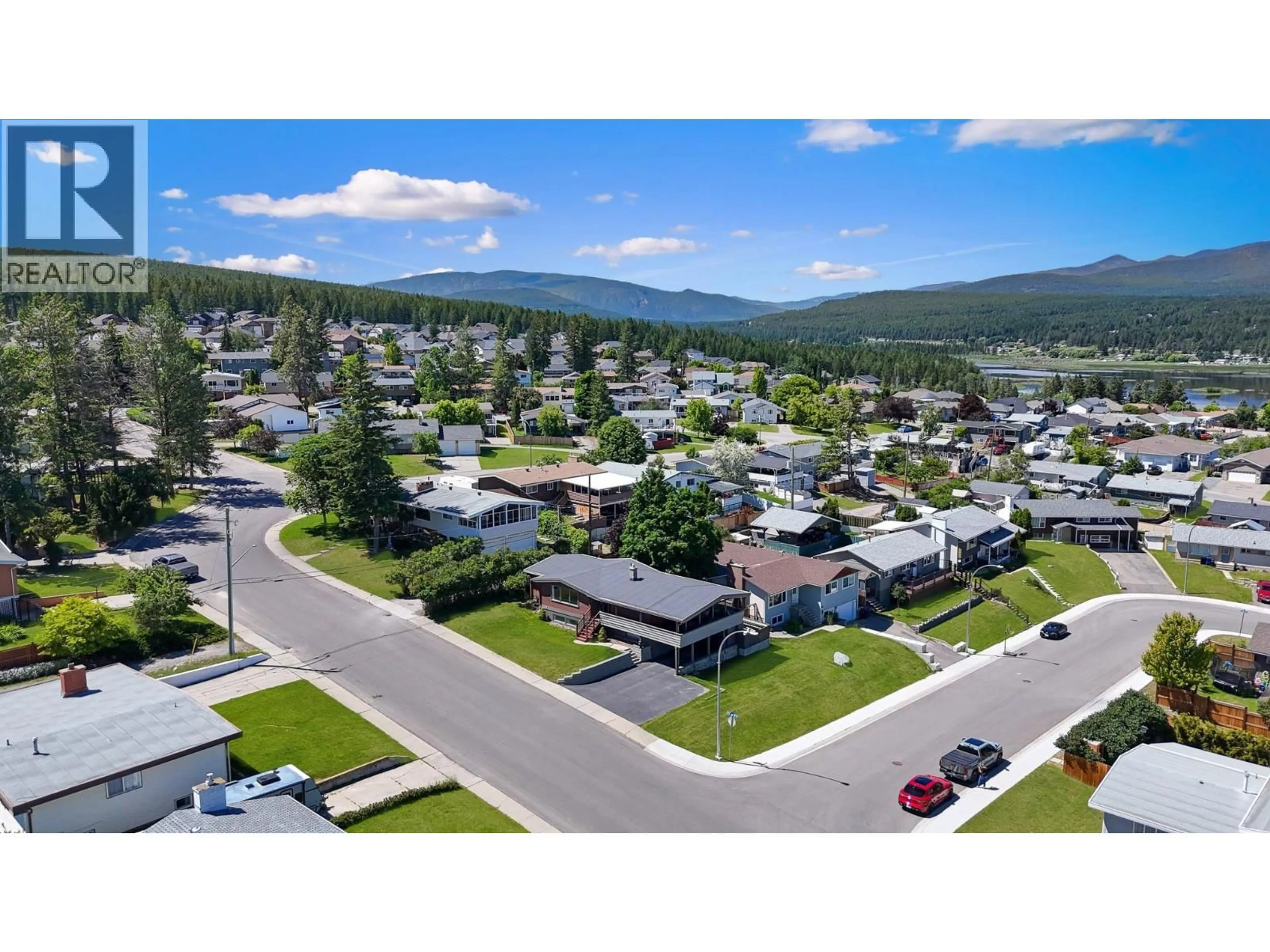 A pic from outside/outdoor area/front of a property/back of a property/a pic from drone, mountain view for 1405 3RD AVENUE SOUTH, Cranbrook British Columbia V1C2C9