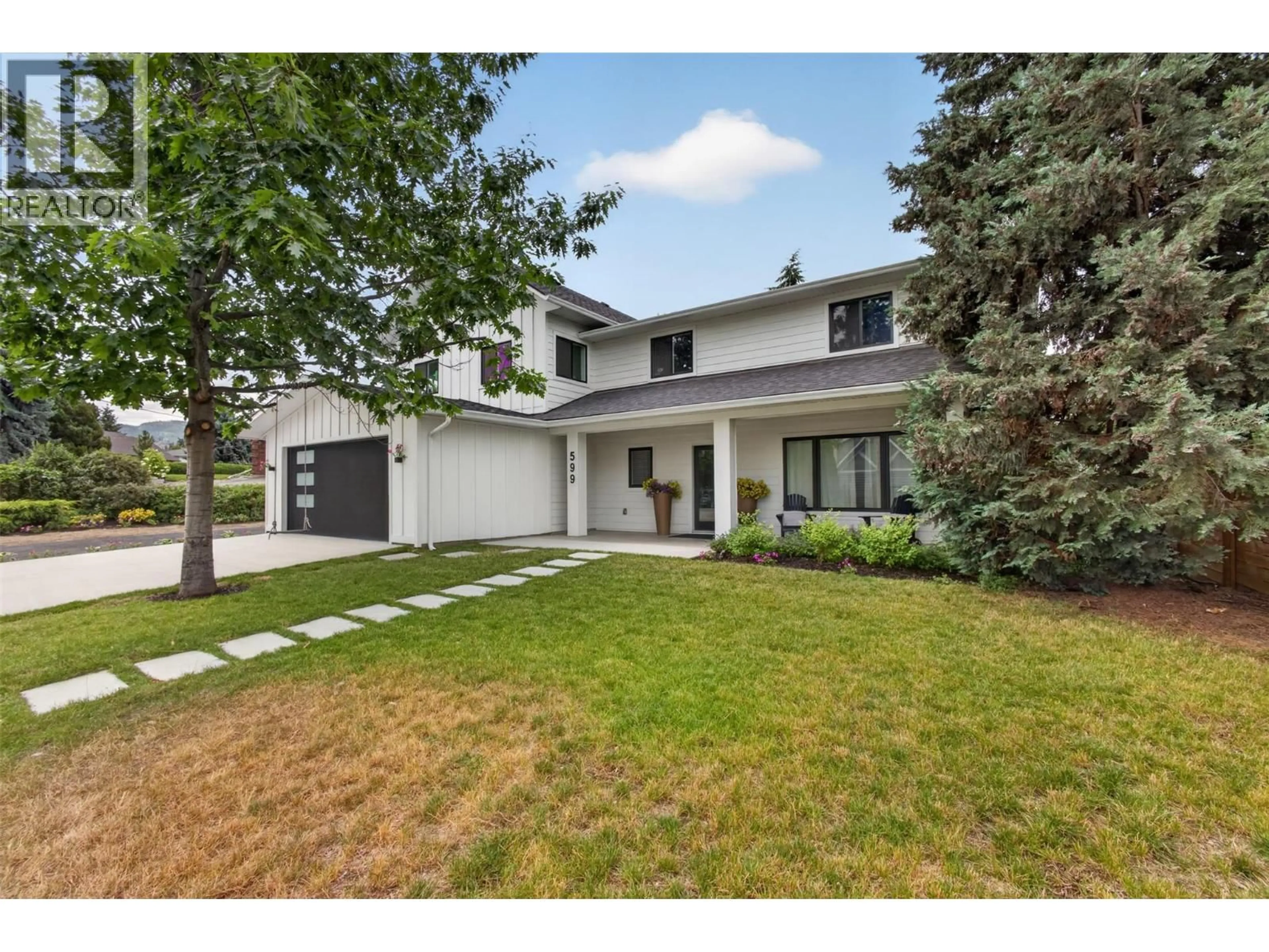 Home with vinyl exterior material, street for 599 SHERWOOD ROAD, Kelowna British Columbia V1W1E6