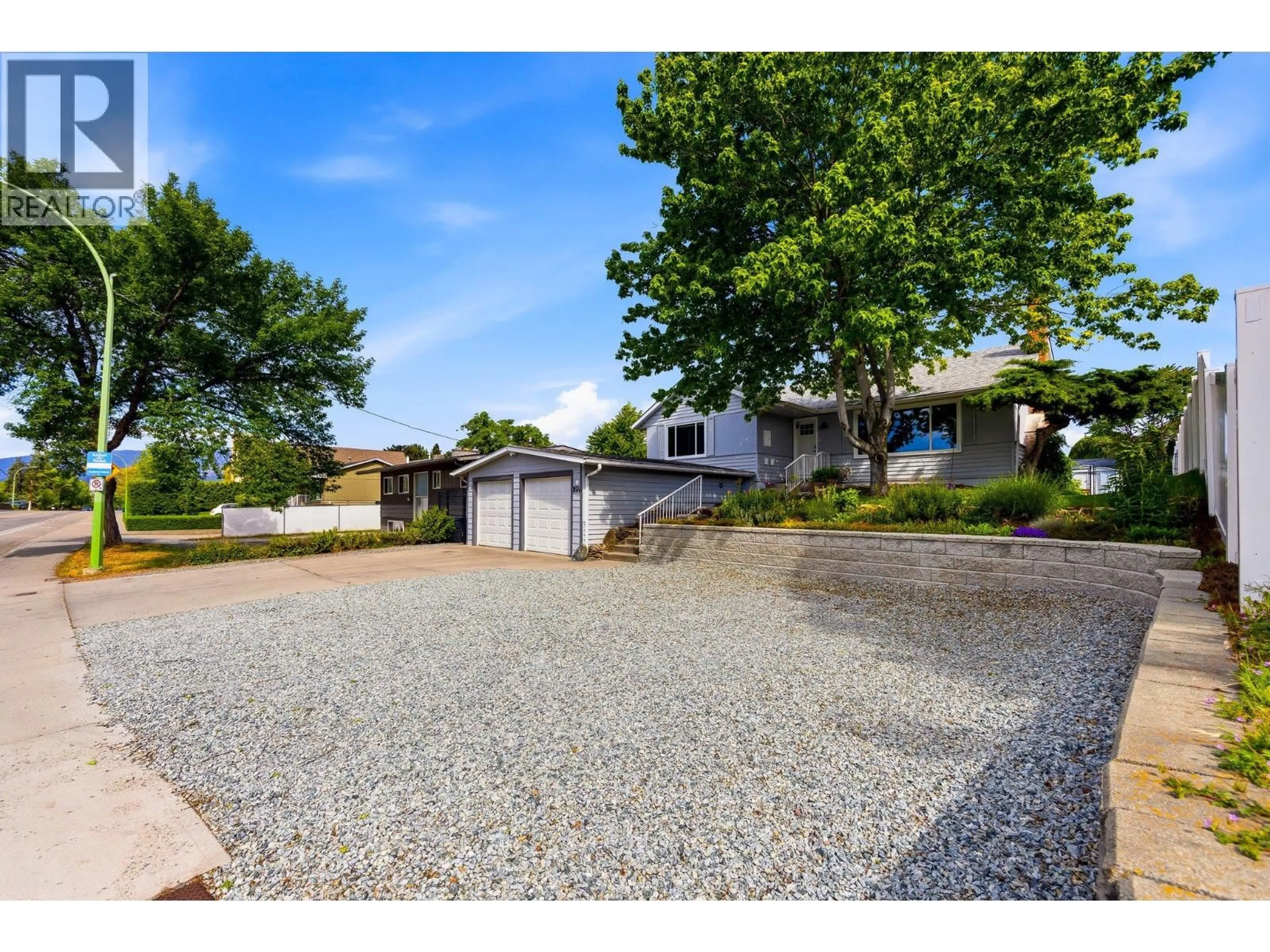 A pic from outside/outdoor area/front of a property/back of a property/a pic from drone, street for 1614 BERNARD AVENUE, Kelowna British Columbia V1Y6R9