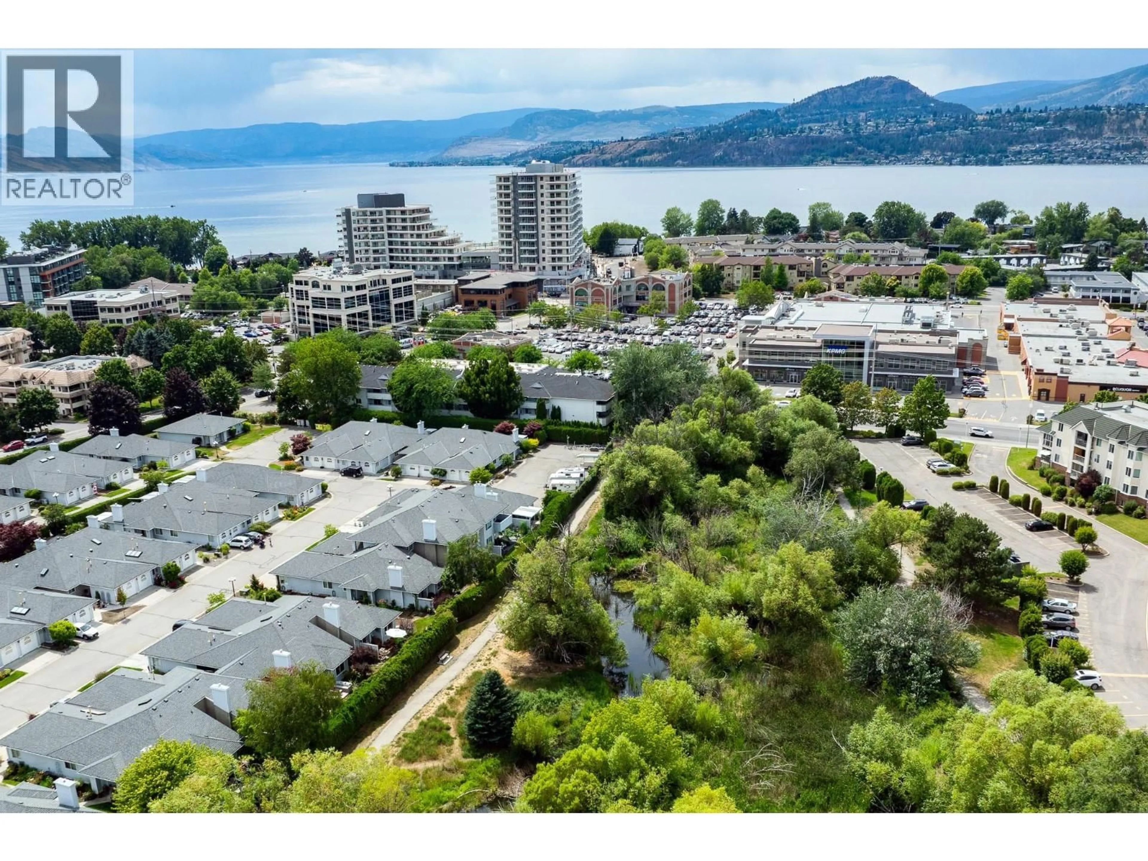 A pic from outside/outdoor area/front of a property/back of a property/a pic from drone, mountain view for 21 - 3370 CASORSO ROAD, Kelowna British Columbia V1Y2V4