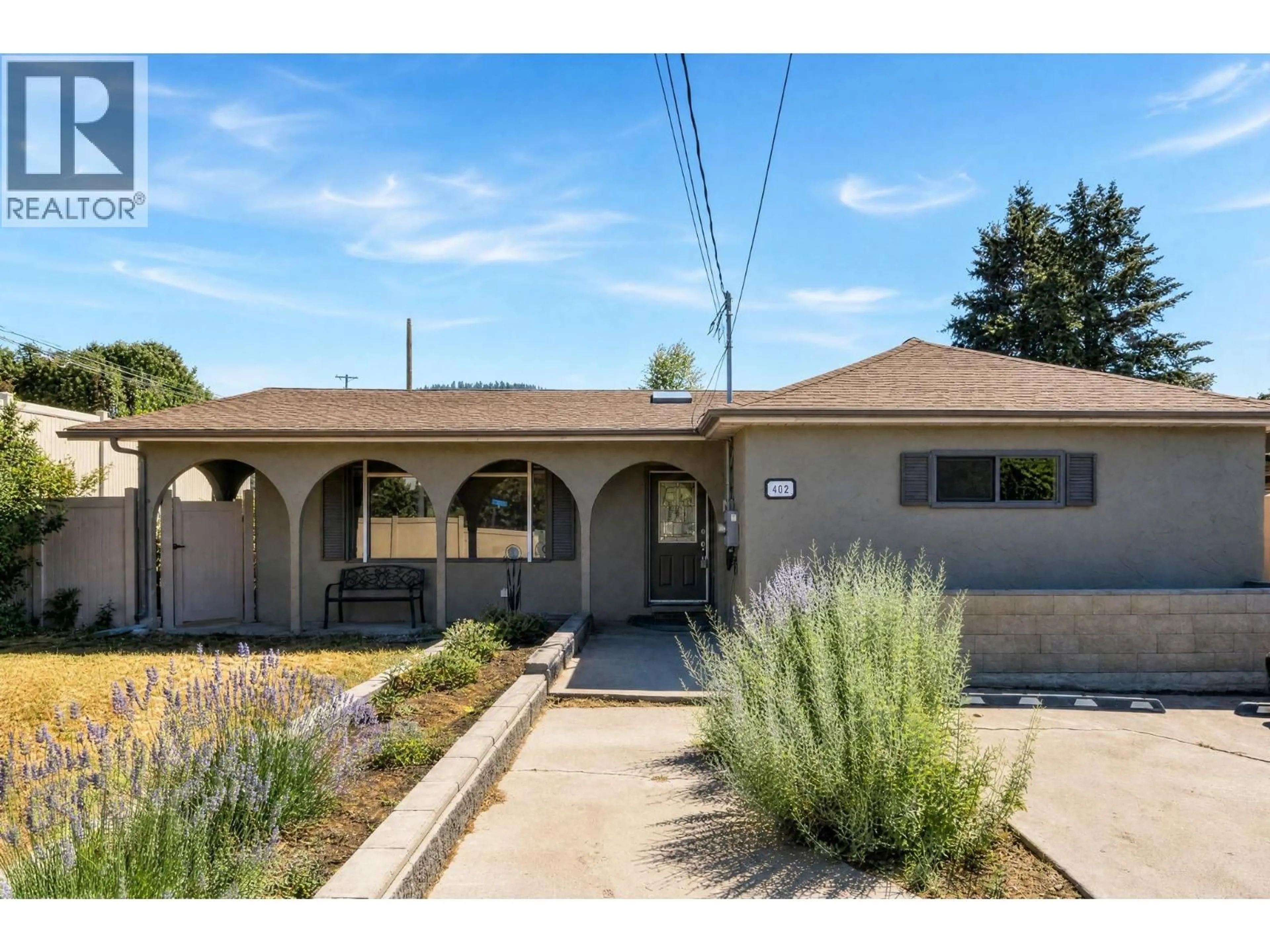 Home with vinyl exterior material, street for 402 TRURO STREET, Penticton British Columbia V2A4C7