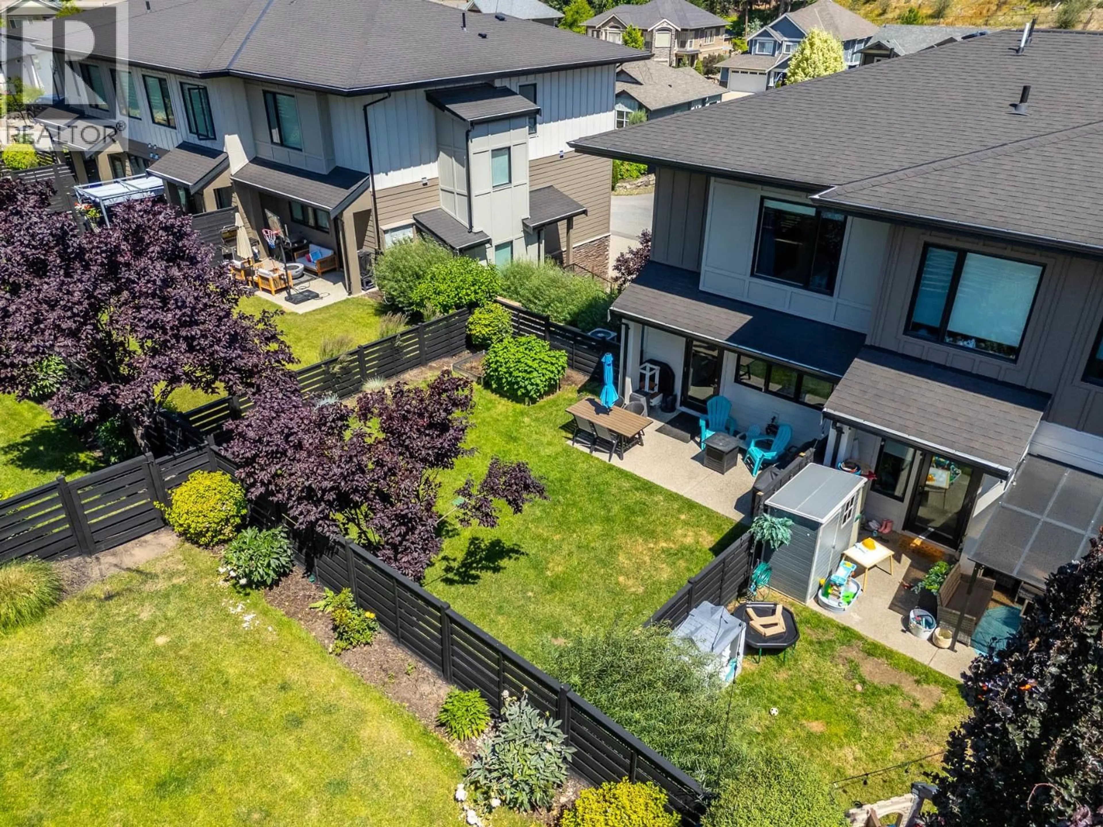 A pic from outside/outdoor area/front of a property/back of a property/a pic from drone, street for 56 - 12798 LAKE HILL DRIVE, Lake Country British Columbia V4V2W5