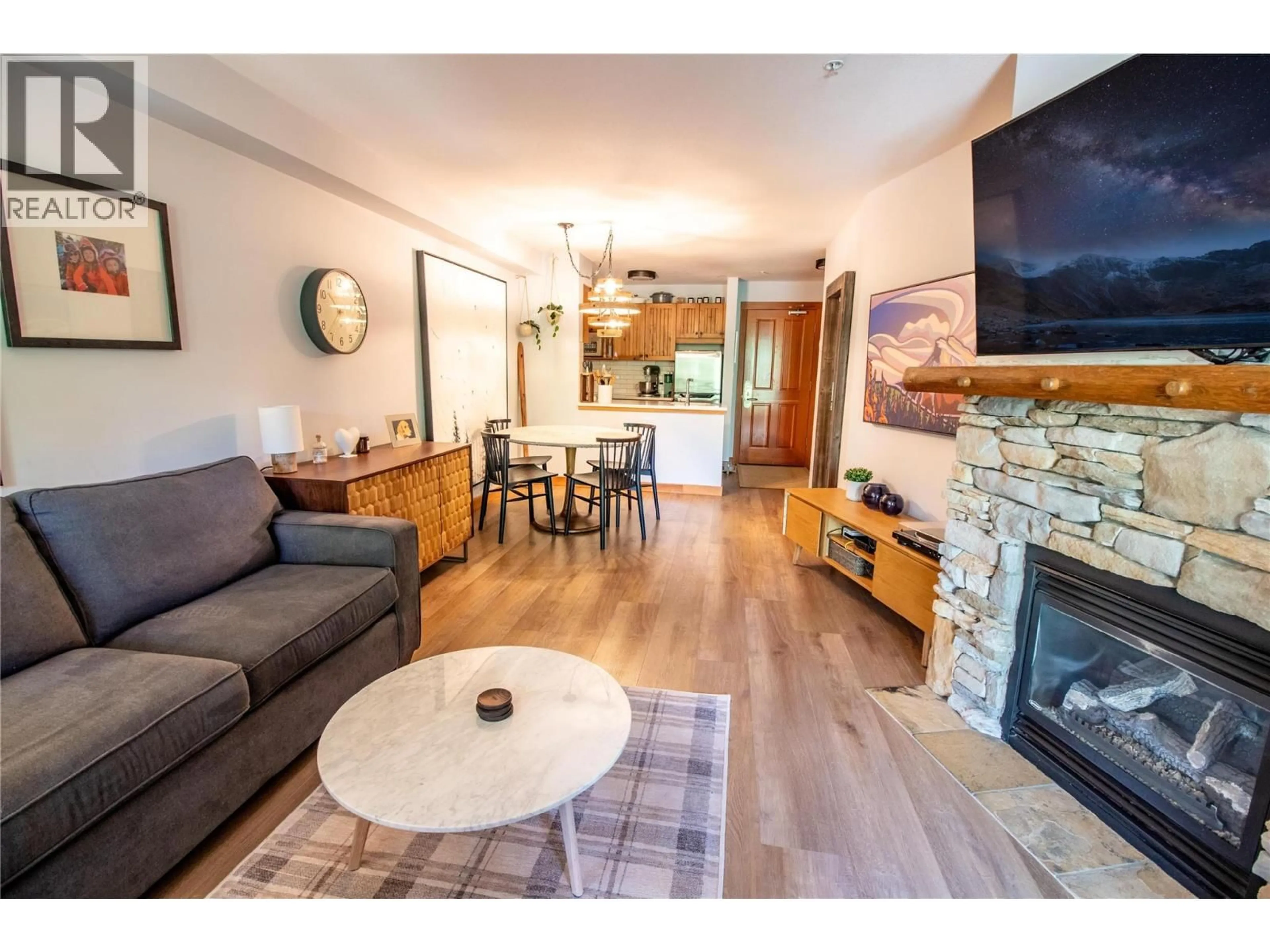 Living room with furniture, wood/laminate floor for 111 - 2080 SUMMIT DRIVE, Panorama British Columbia V0A1T0