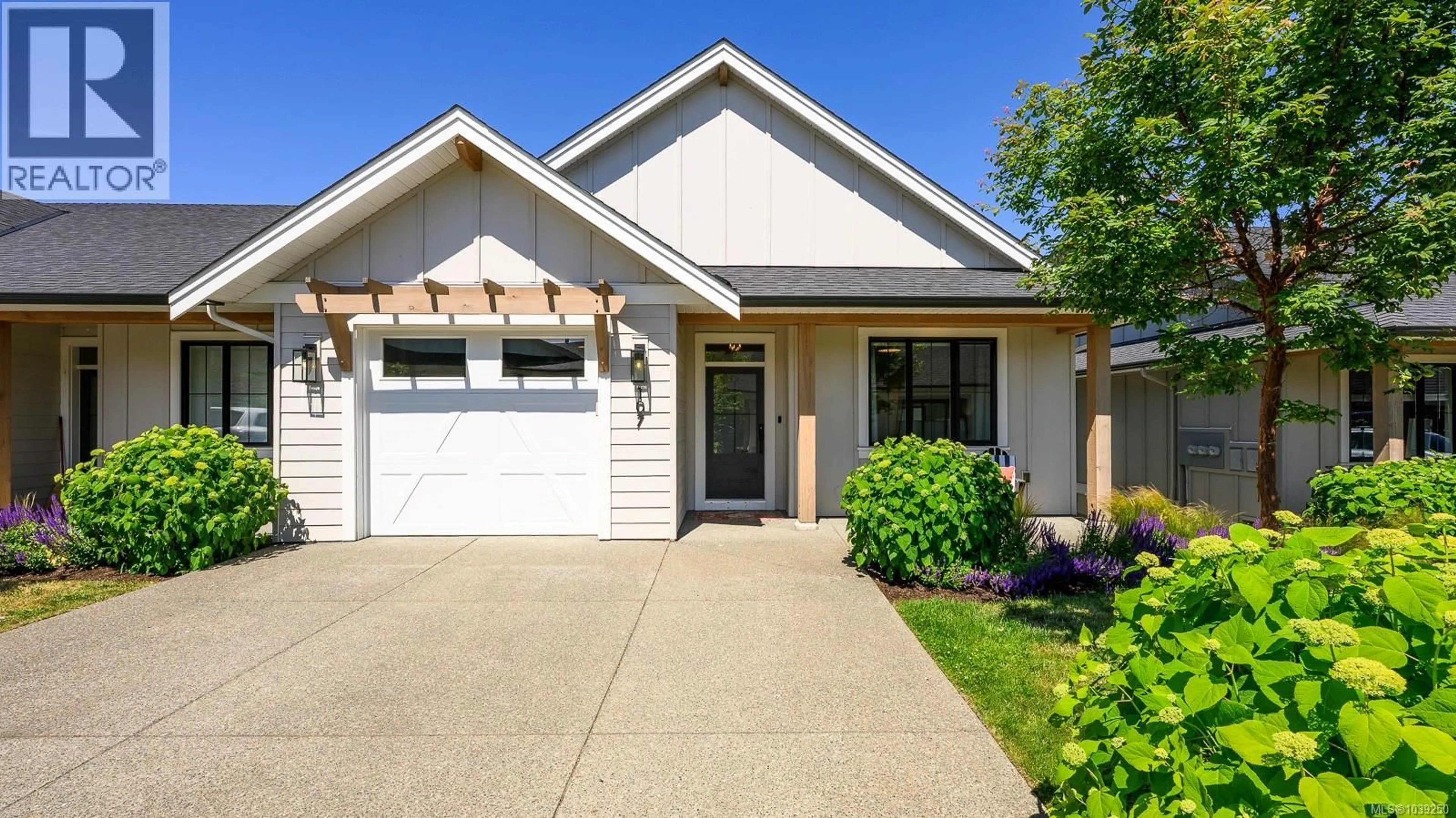 Home with vinyl exterior material, street for 107 - 4098 BUCKSTONE ROAD, Courtenay British Columbia V9N0H2