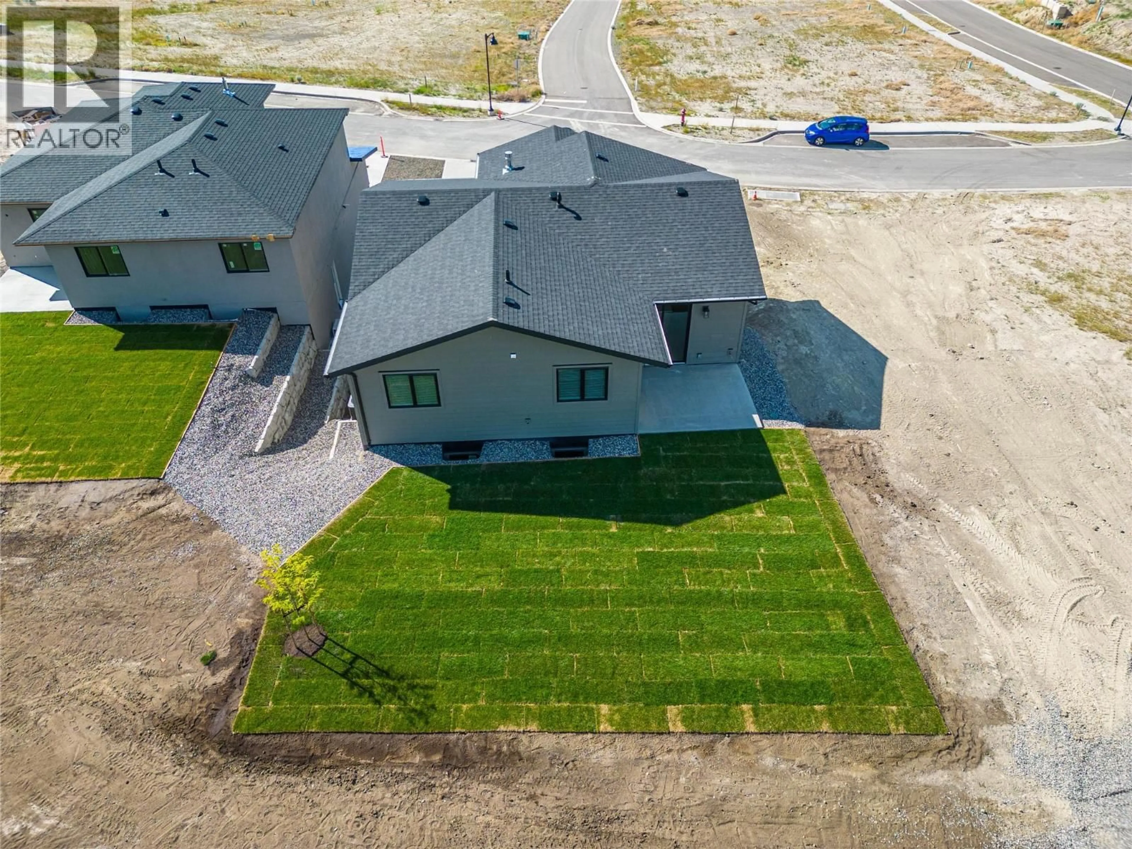 A pic from outside/outdoor area/front of a property/back of a property/a pic from drone, street for 113 - 38 RUE CHEVAL NOIR OTHER, Kamloops British Columbia V1S0G5