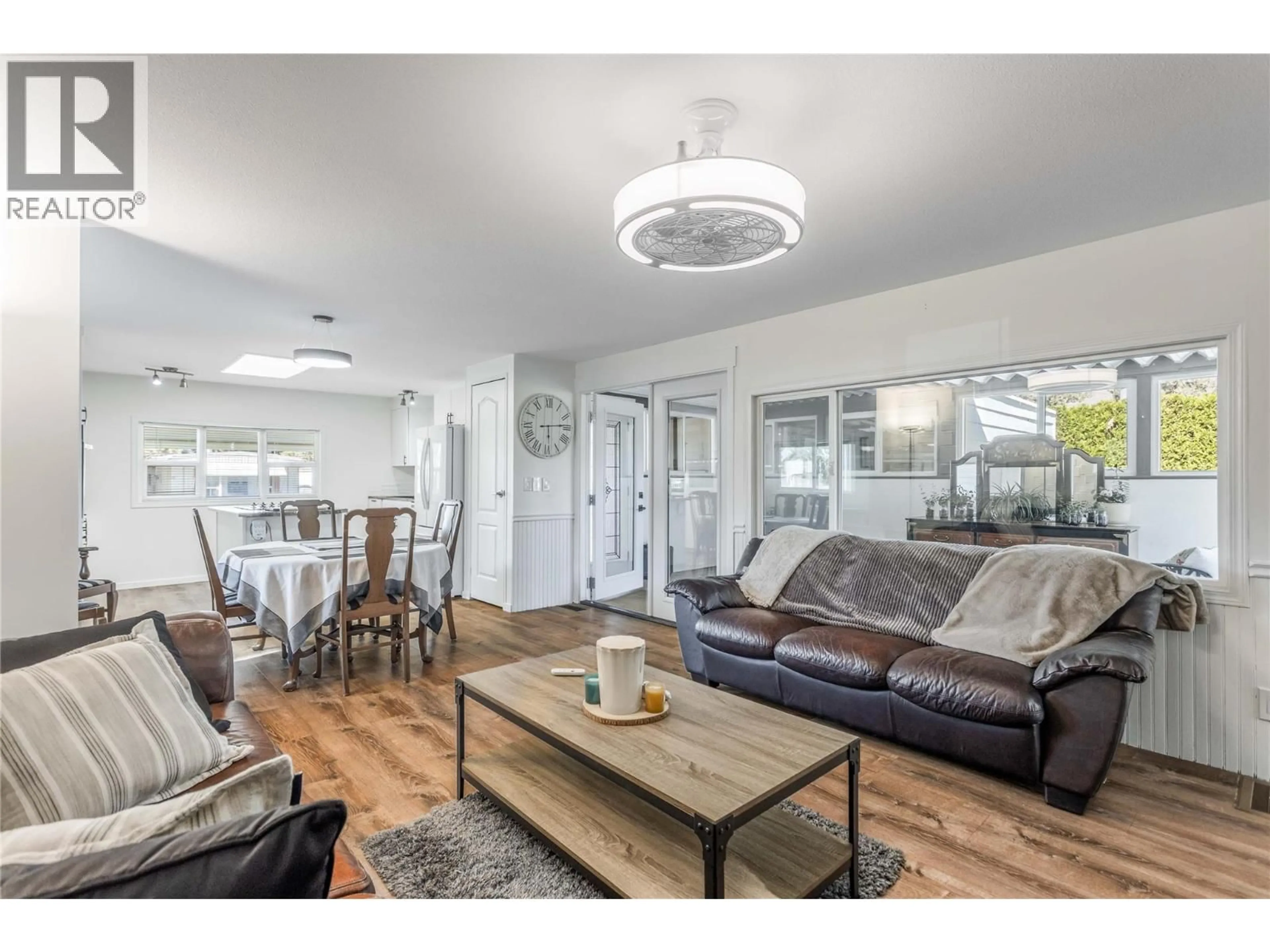 Living room with furniture, wood/laminate floor for 1 - 1929 HIGHWAY 97 S OTHER, West Kelowna British Columbia V1Z2Z1
