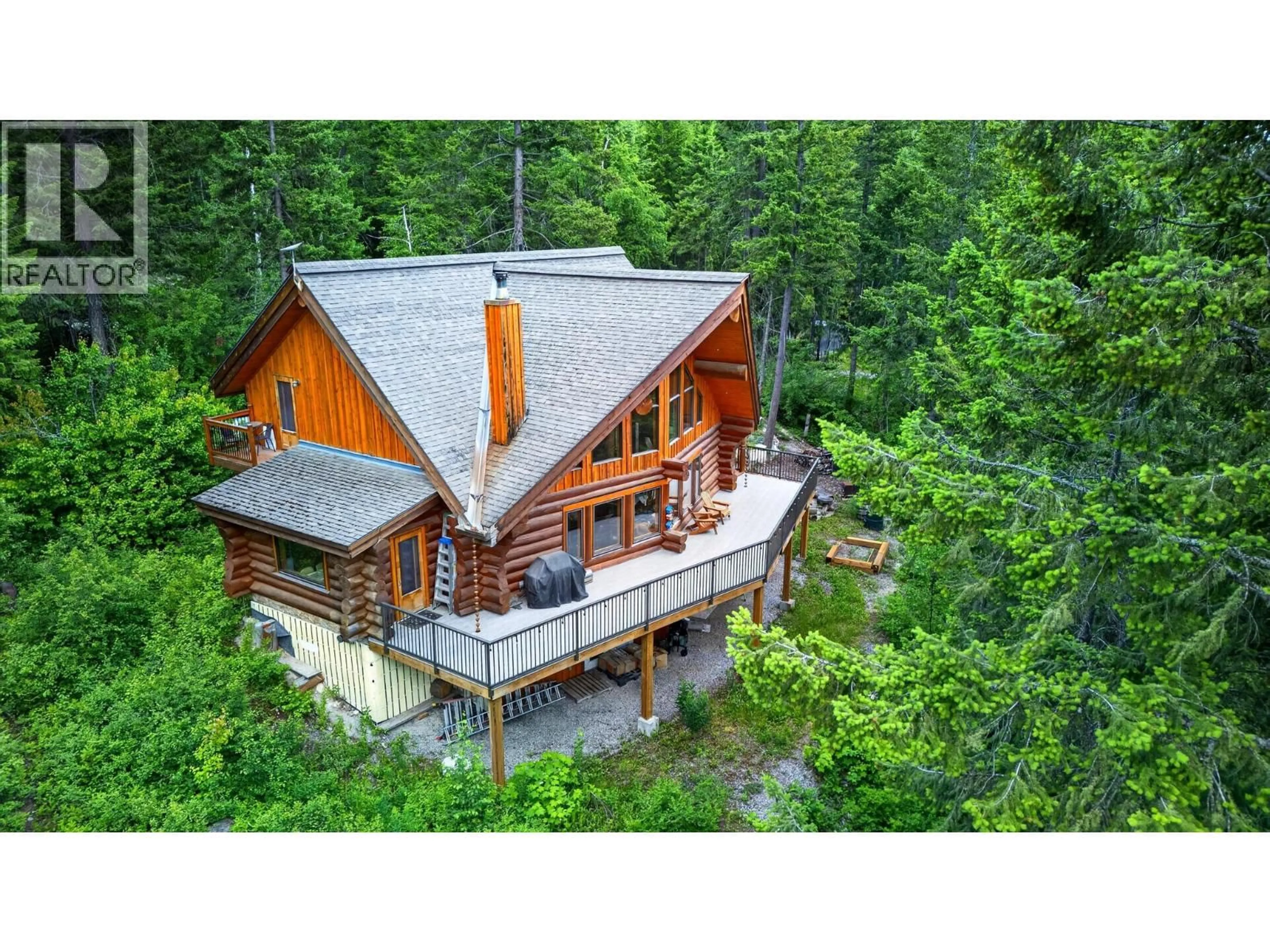 A pic from outside/outdoor area/front of a property/back of a property/a pic from drone, unknown for 1419 BLACK BEAR DRIVE, Golden British Columbia V0A1H7