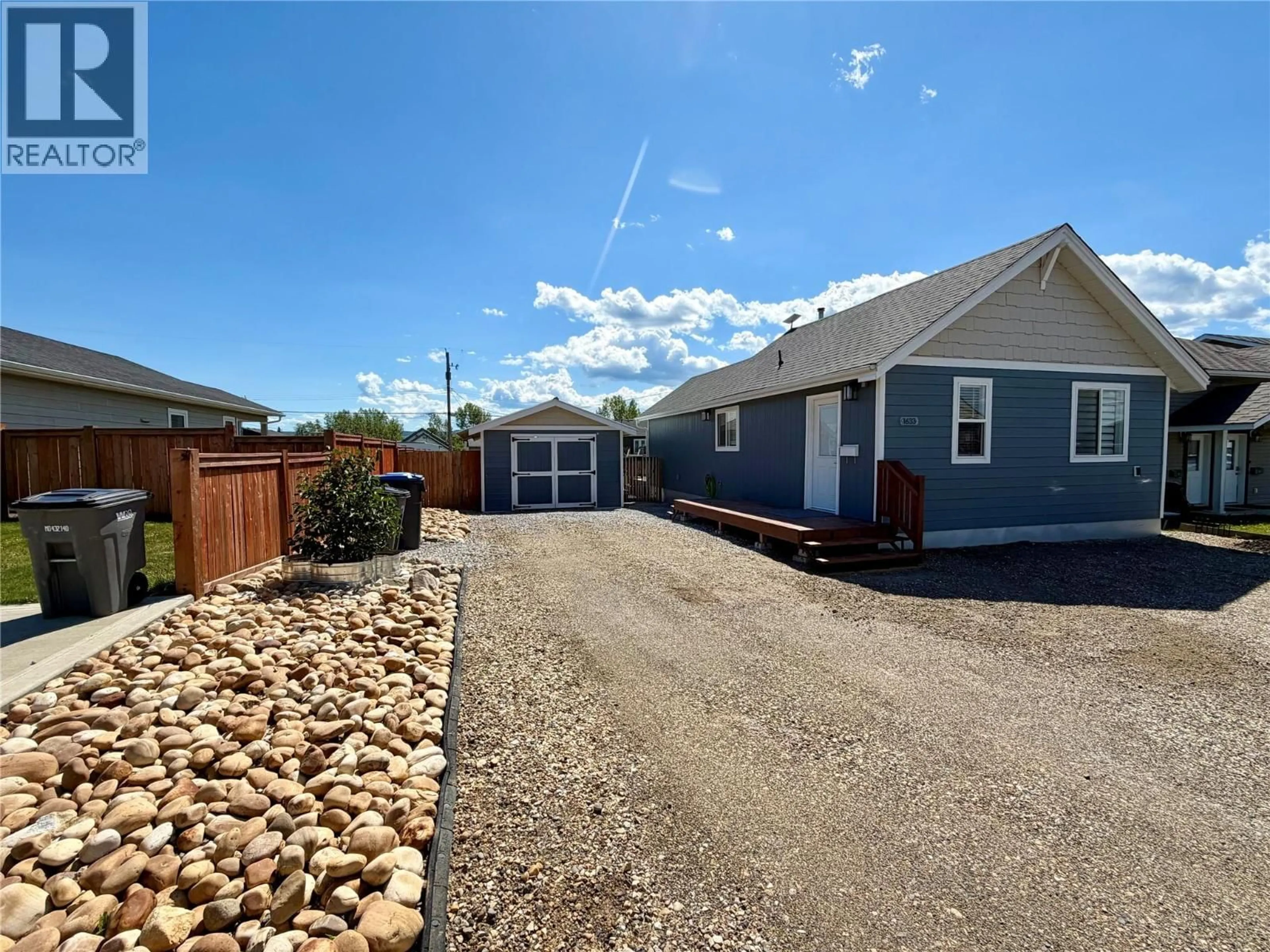 A pic from outside/outdoor area/front of a property/back of a property/a pic from drone, street for 1633 100 AVENUE, Dawson Creek British Columbia V1G1X3