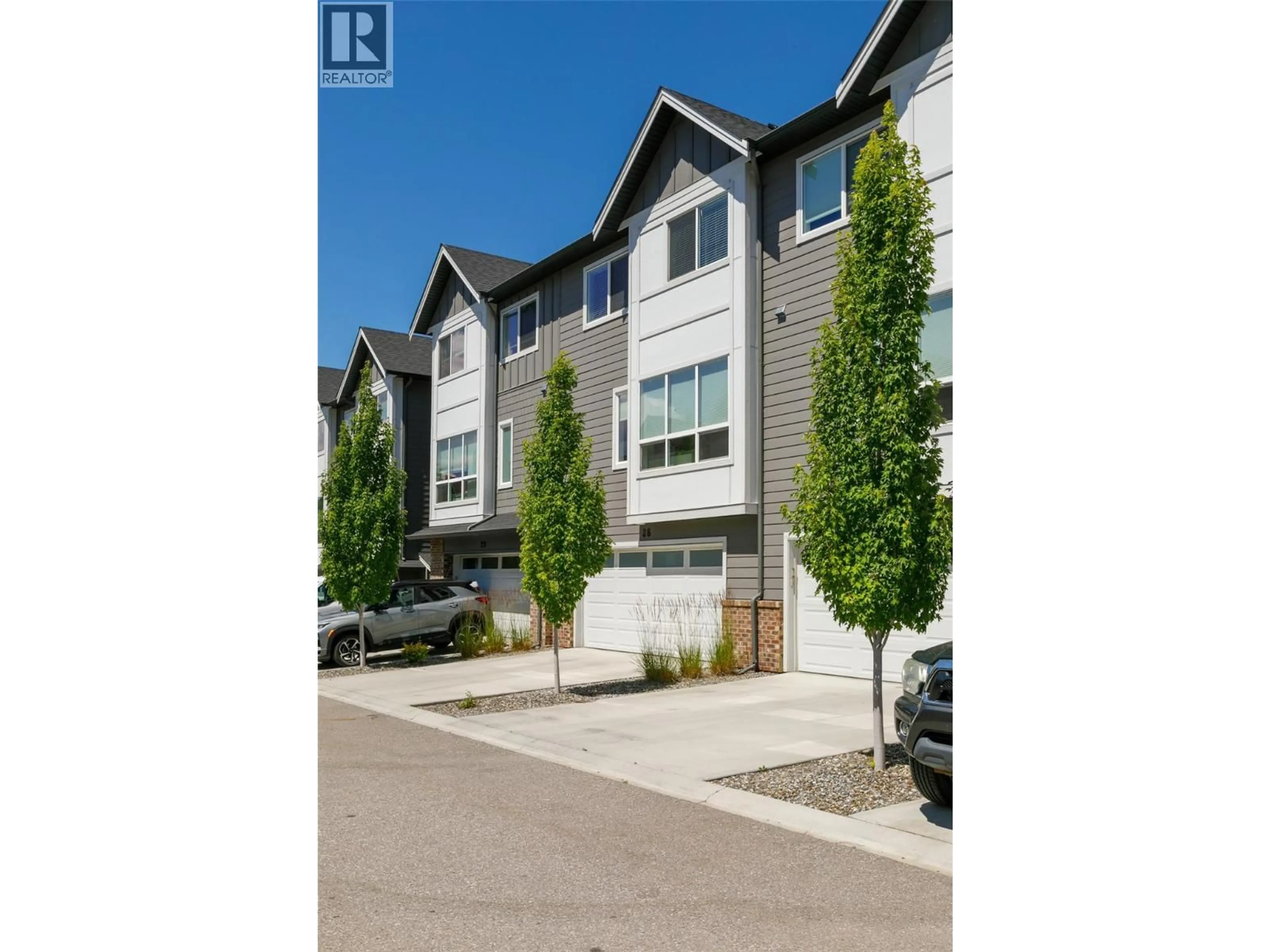 A pic from outside/outdoor area/front of a property/back of a property/a pic from drone, street for 28 - 12075 OCEOLA ROAD, Lake Country British Columbia V4V1H1