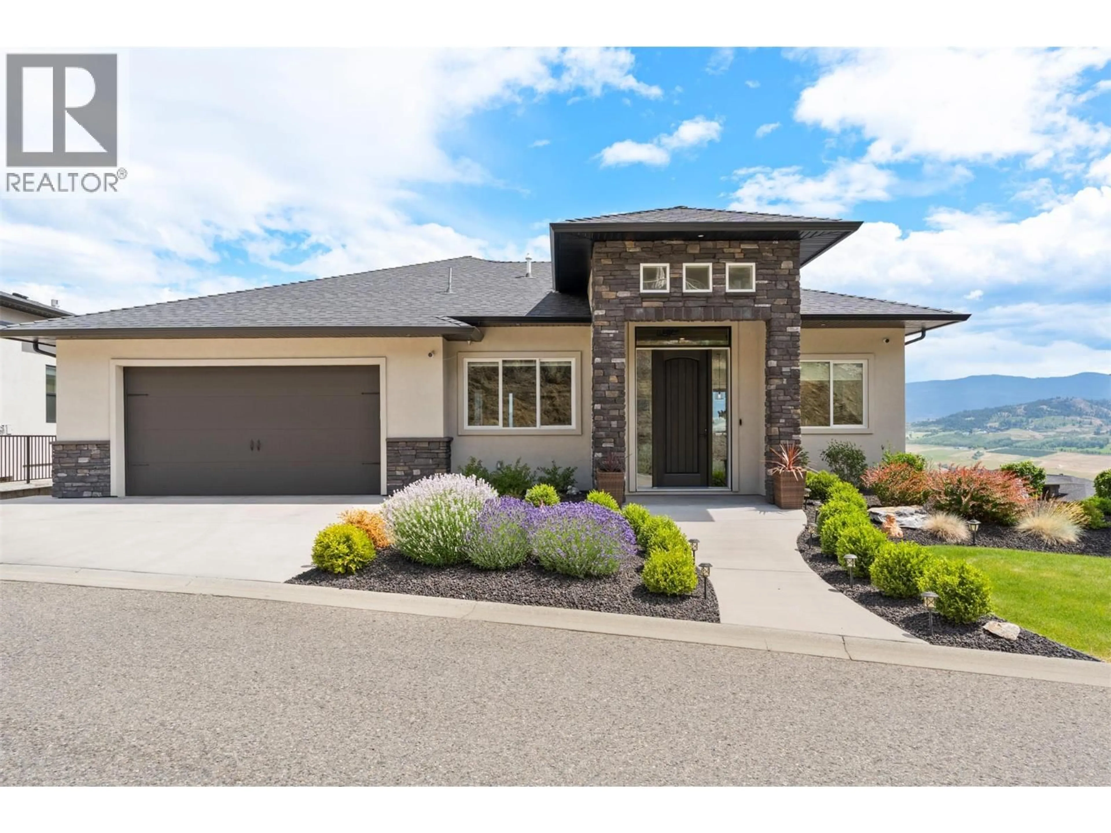 Home with brick exterior material, street for 1400 SILVERSAGE LANE, Vernon British Columbia V1H2J2