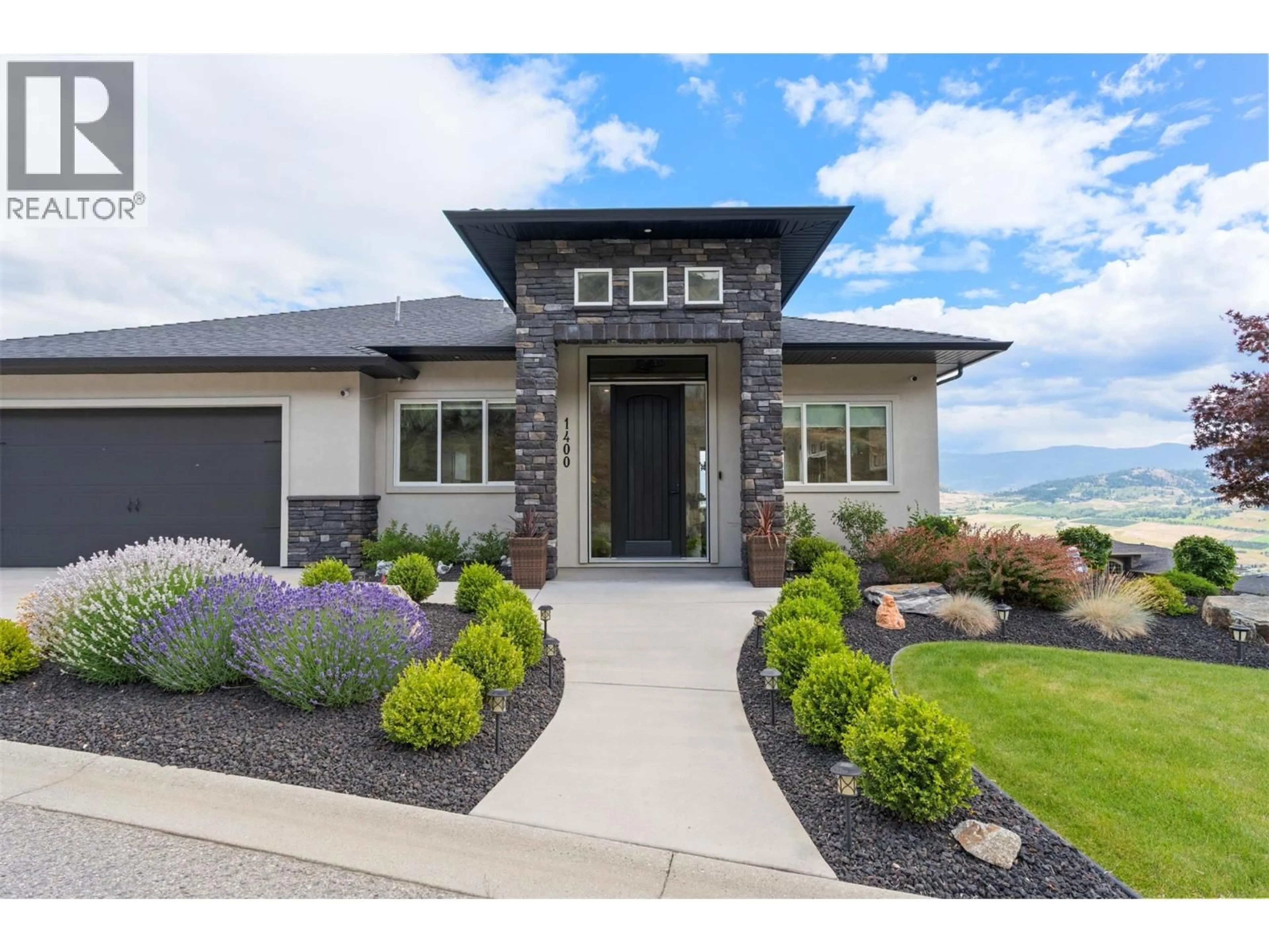 Home with brick exterior material, unknown for 1400 SILVERSAGE LANE, Vernon British Columbia V1H2J2