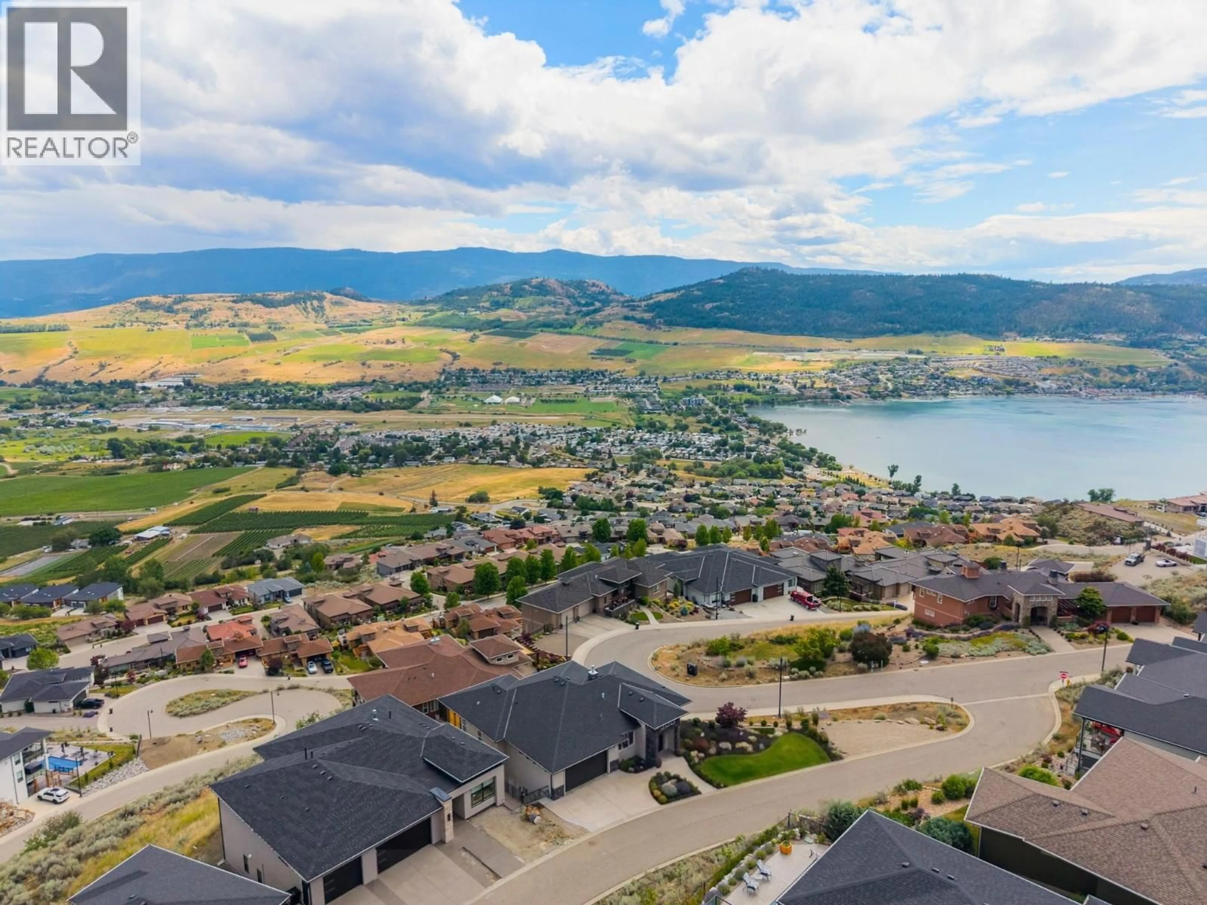 A pic from outside/outdoor area/front of a property/back of a property/a pic from drone, water/lake/river/ocean view for 1400 SILVERSAGE LANE, Vernon British Columbia V1H2J2