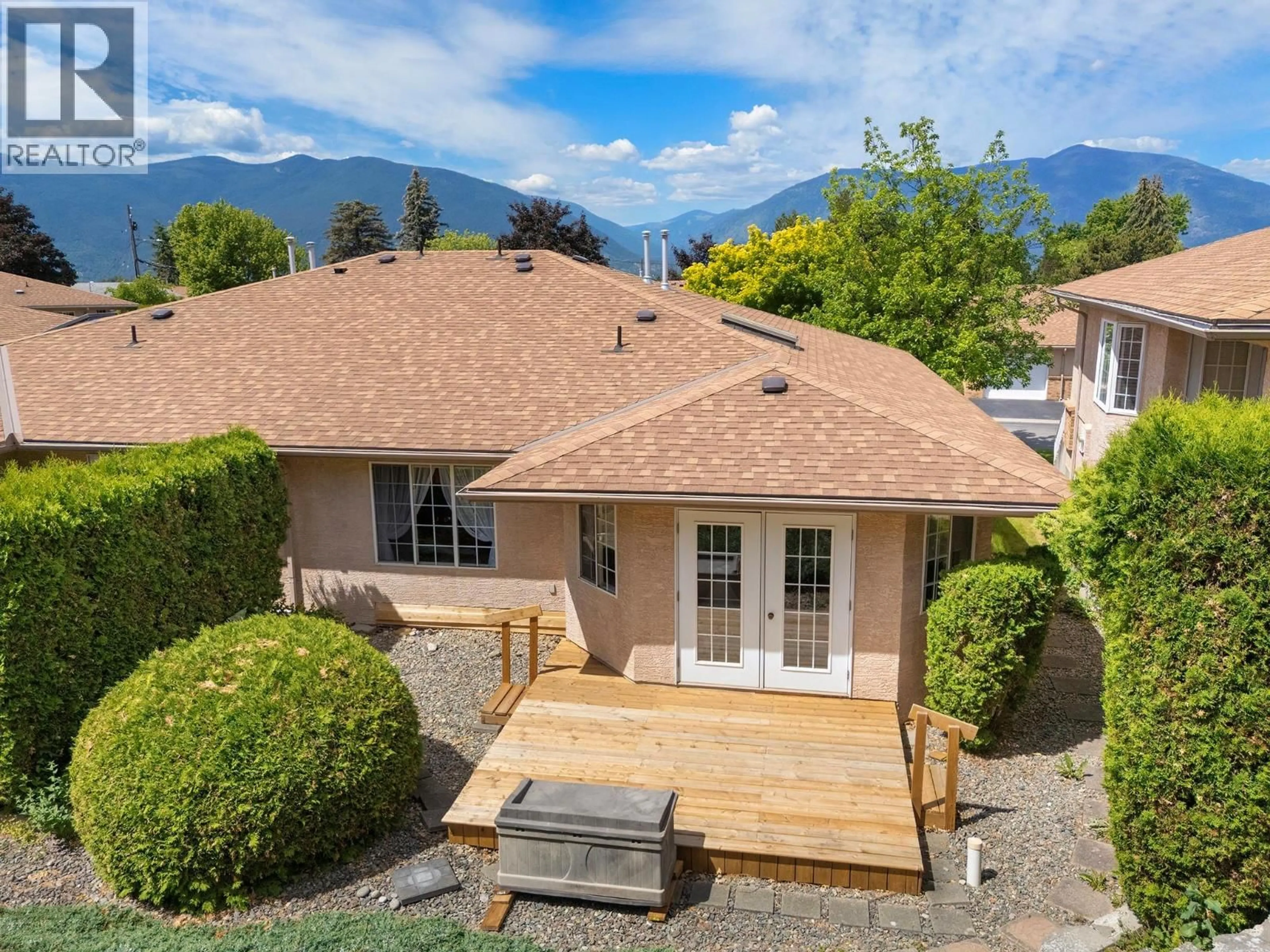 A pic from outside/outdoor area/front of a property/back of a property/a pic from drone, mountain view for 14 - 310 6TH AVENUE SOUTH, Creston British Columbia V0B1G3