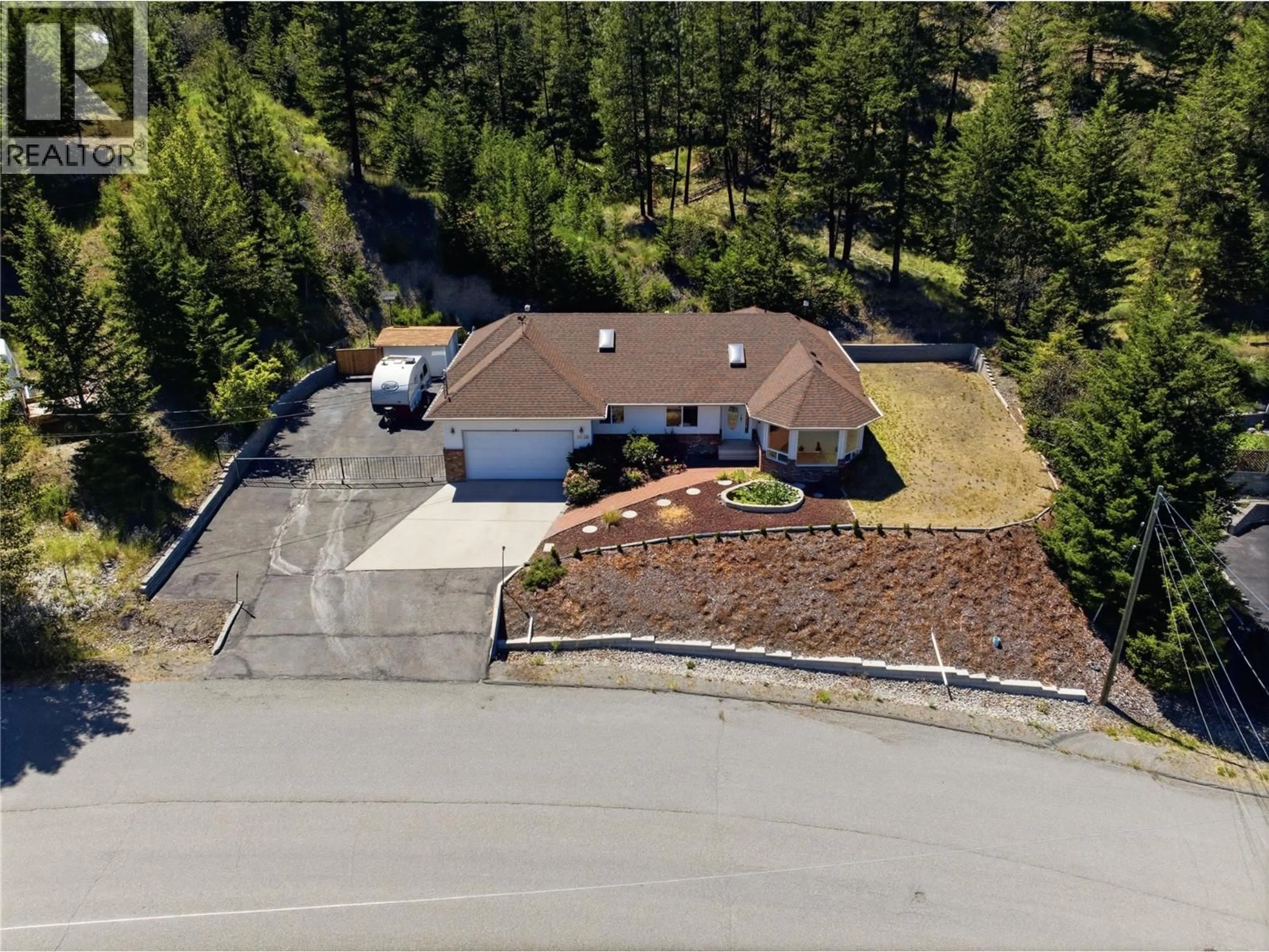 A pic from outside/outdoor area/front of a property/back of a property/a pic from drone, unknown for 4826 UPLANDS DRIVE, Kamloops British Columbia V2C6S9