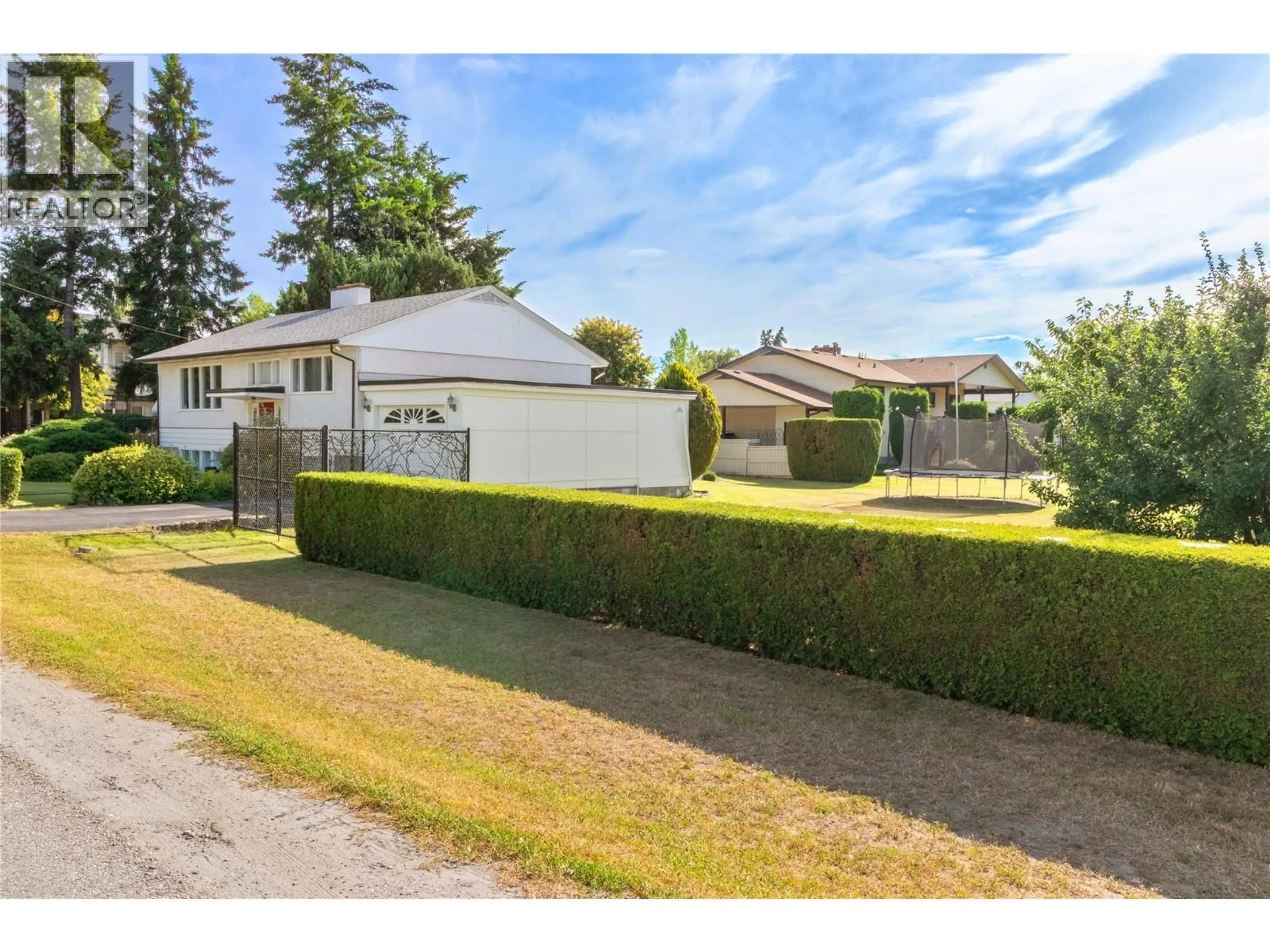A pic from outside/outdoor area/front of a property/back of a property/a pic from drone, street for 350 FLEMING ROAD, Kelowna British Columbia V1X3Z3