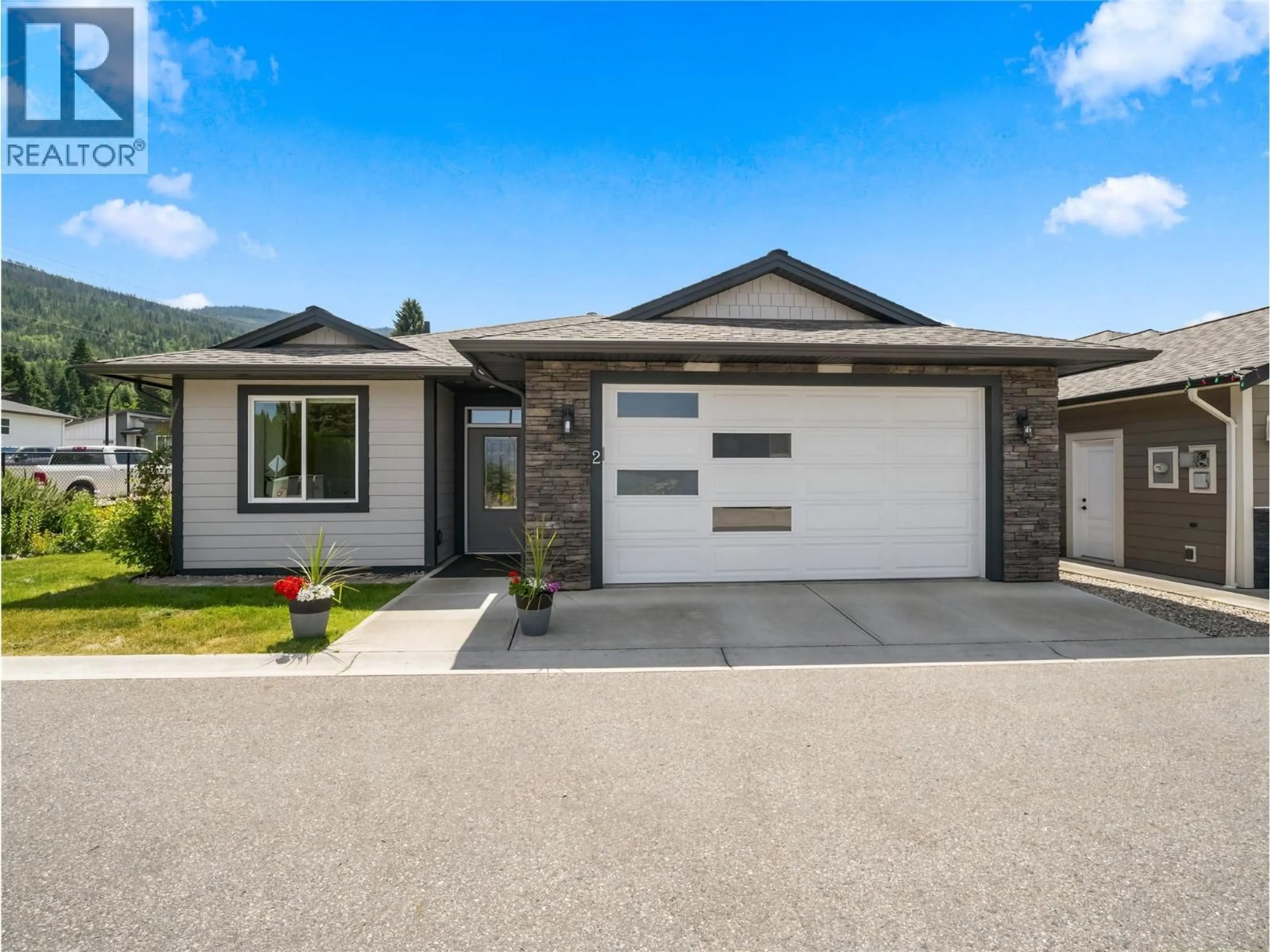 Home with vinyl exterior material, street for 2 - 1791 10 STREET SOUTHWEST, Salmon Arm British Columbia V1E0E9