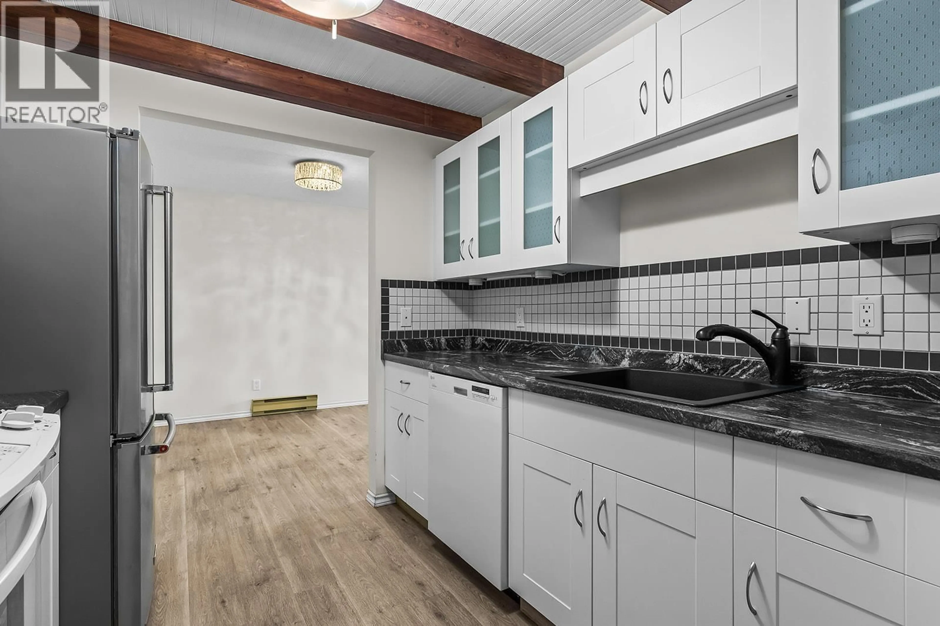 Standard kitchen, ceramic/tile floor for 319 - 1450 BERTRAM STREET, Kelowna British Columbia V1Y8R9