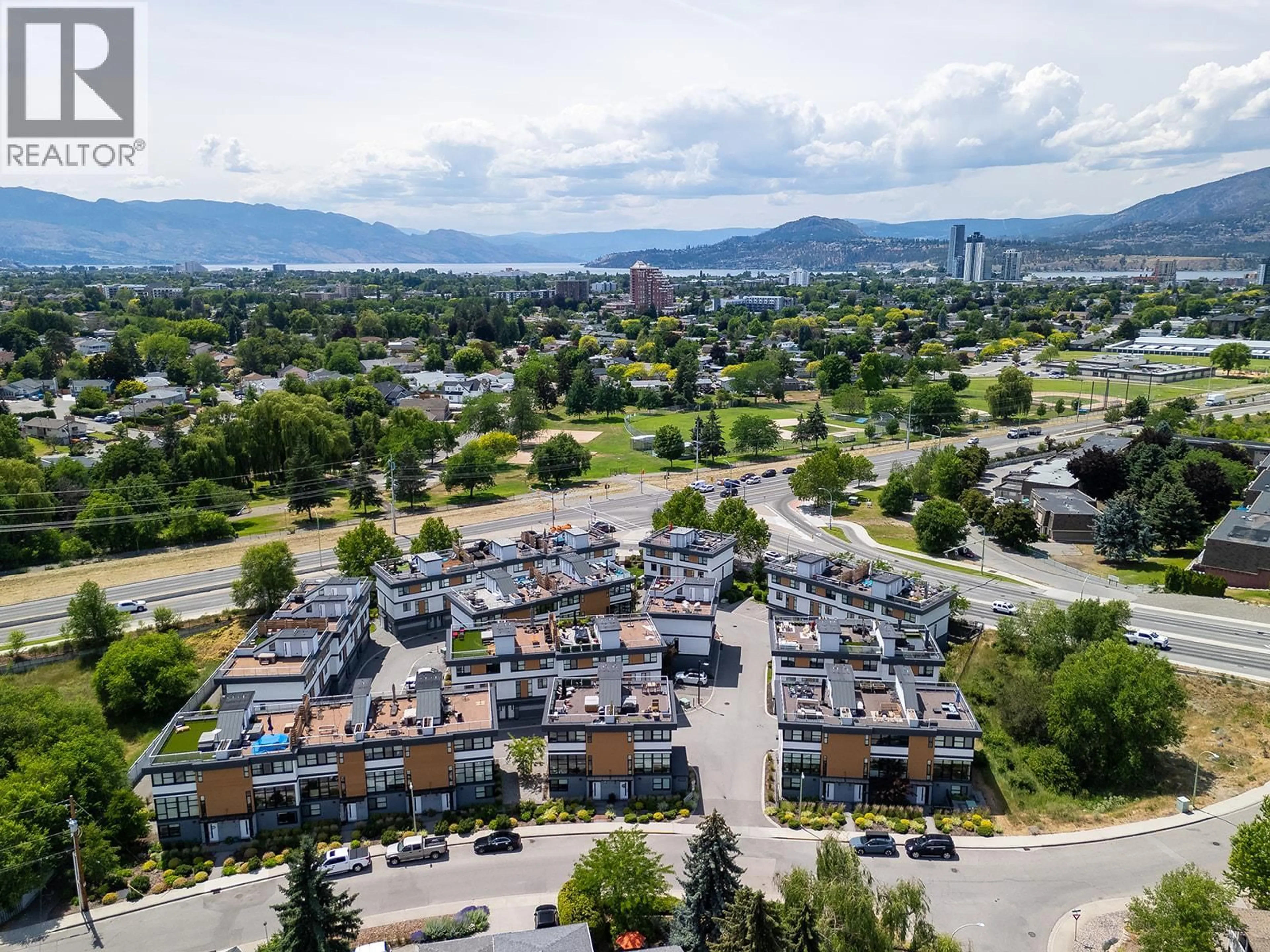 A pic from outside/outdoor area/front of a property/back of a property/a pic from drone, mountain view for 20 - 1515 HIGHLAND DRIVE NORTH, Kelowna British Columbia V1Y0C9
