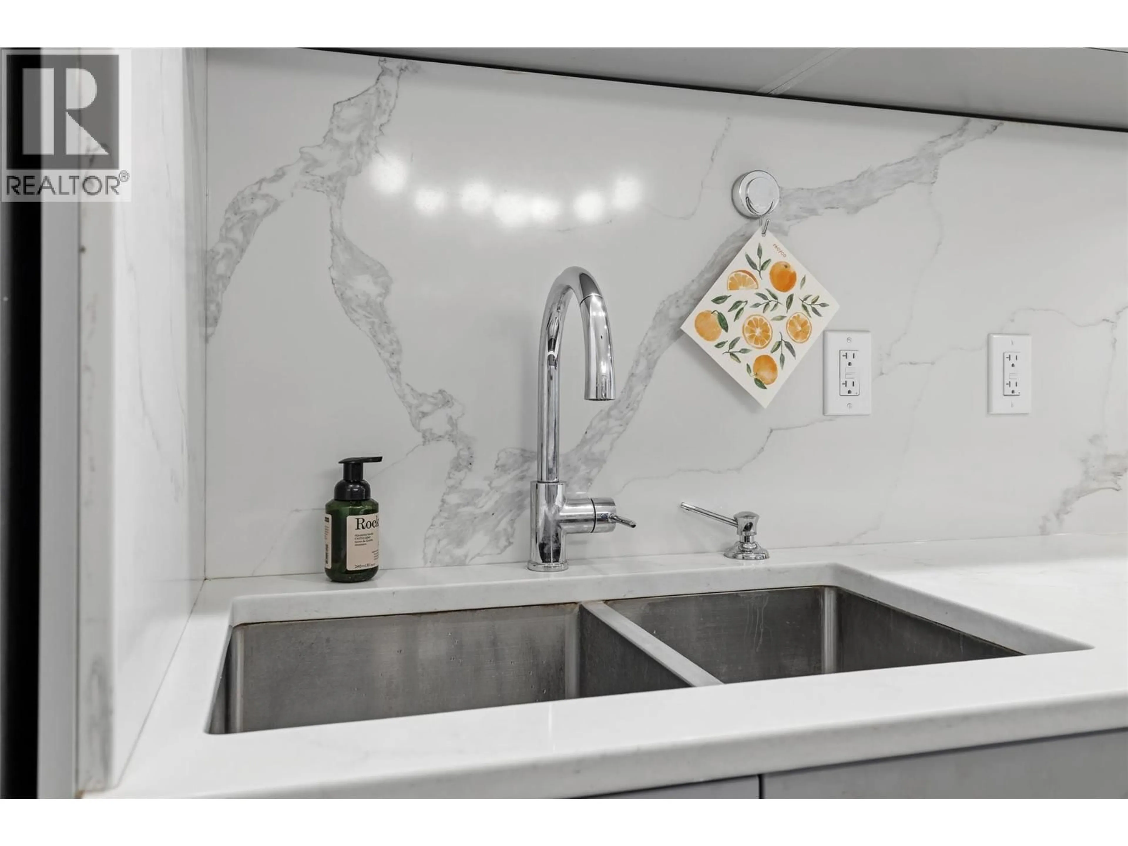 Contemporary kitchen, ceramic/tile floor for 203 - 880 SAUCIER AVENUE, Kelowna British Columbia V1Y0H4